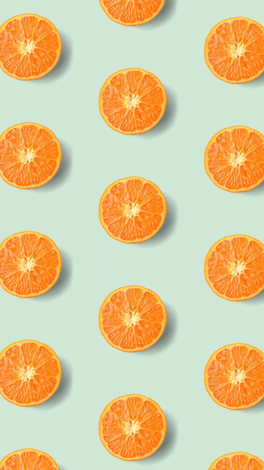 vibrant orange slices, neat grid, soft mint green background, Full HD Phone Wallpaper