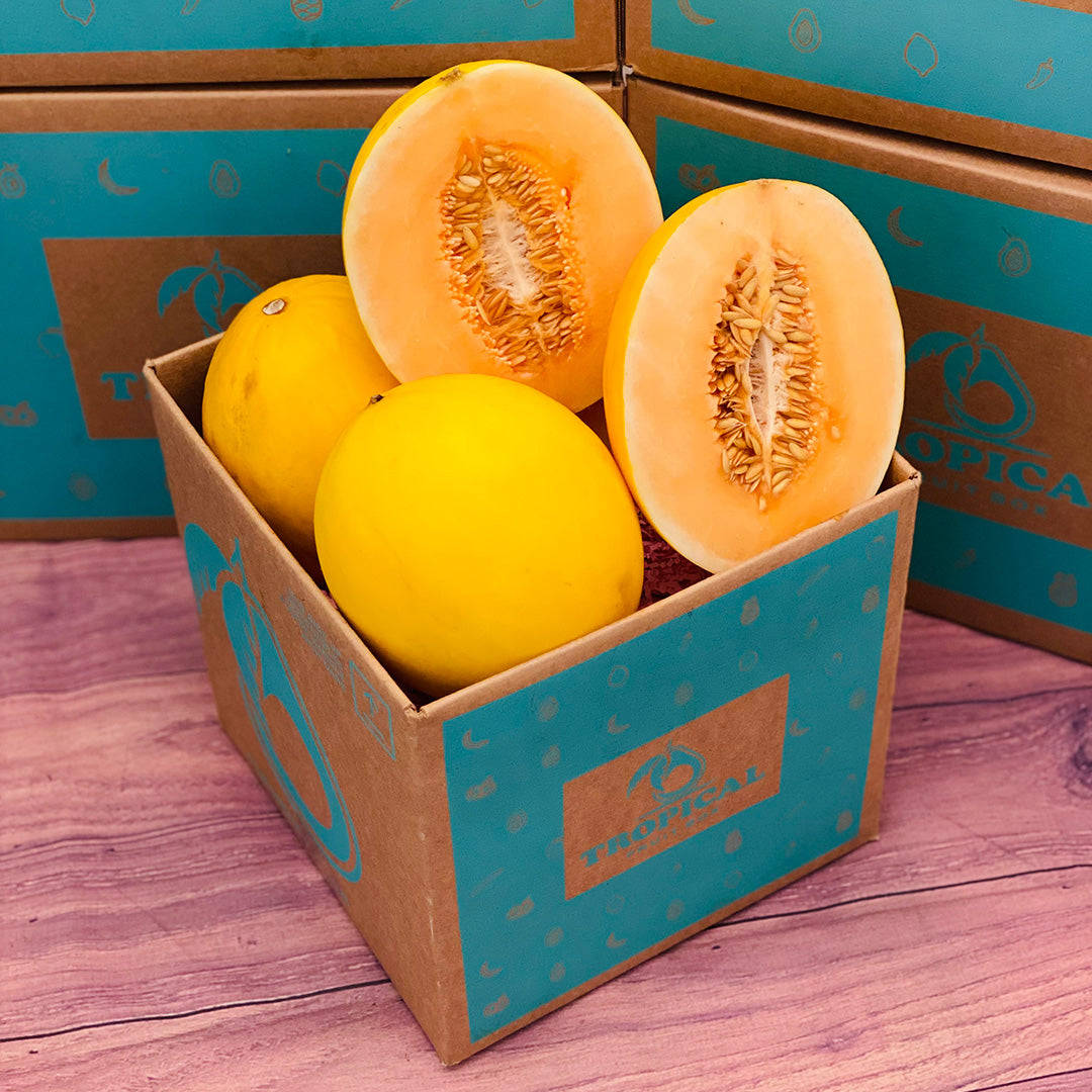 canary melon, cardboard box, vibrant yellow cantaloupes, SD Desktop Wallpaper