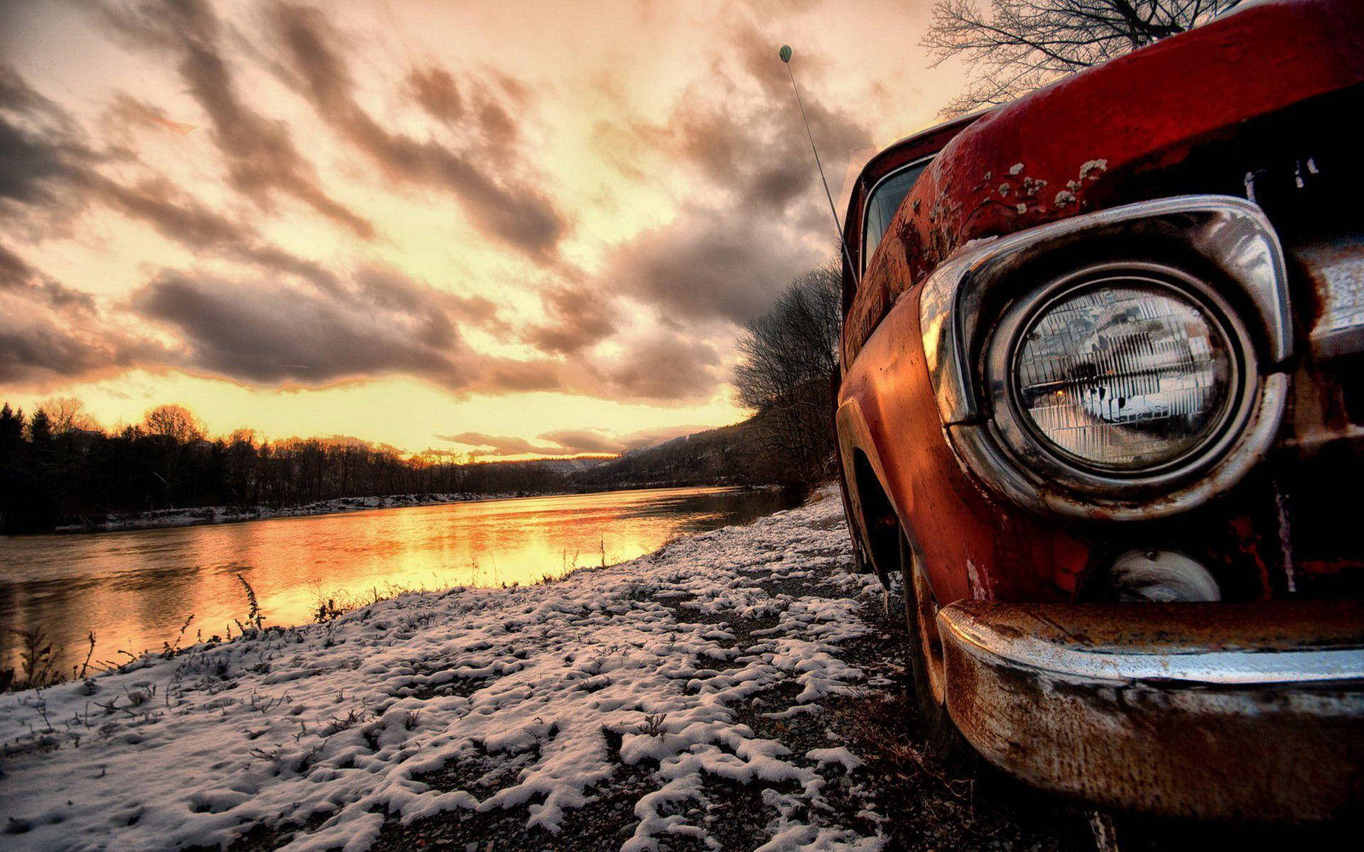 lakeside car, rusted red vintage car, snow-dusted riverbank, Full HD Desktop Wallpaper