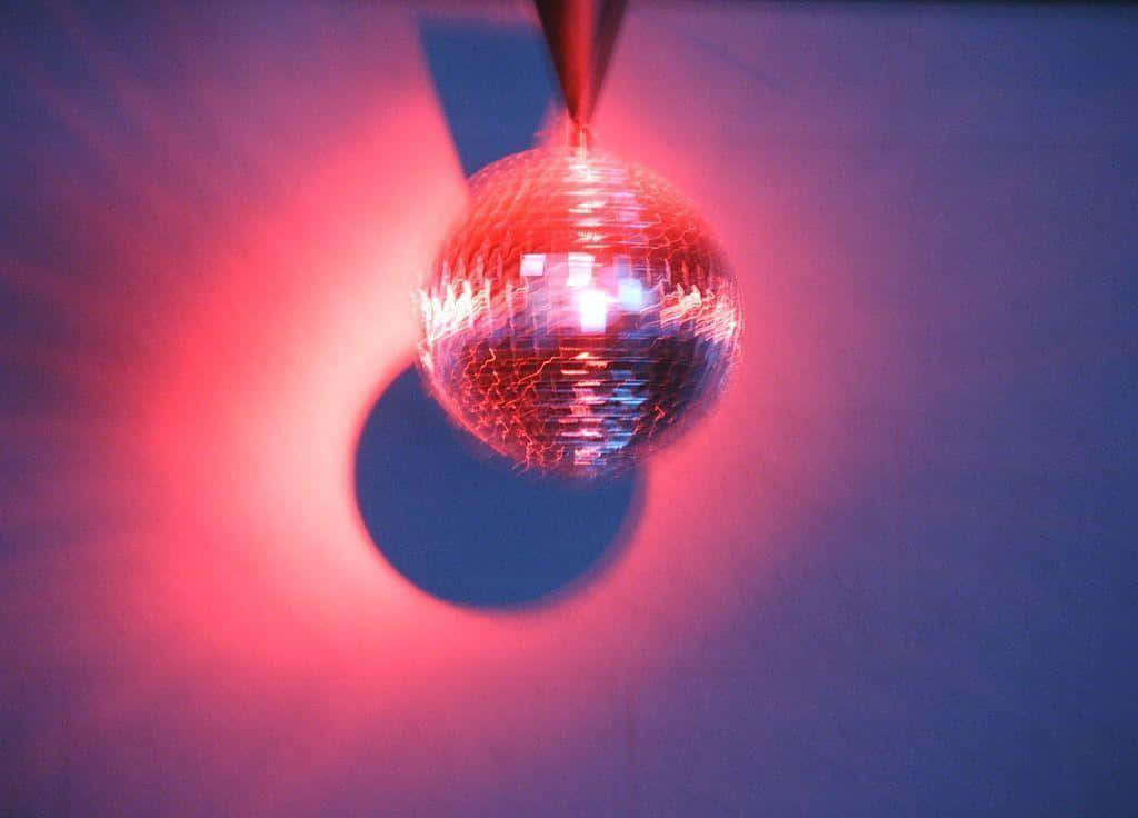 disco ball, vibrant red and blue light, dark wall, SD Desktop Wallpaper
