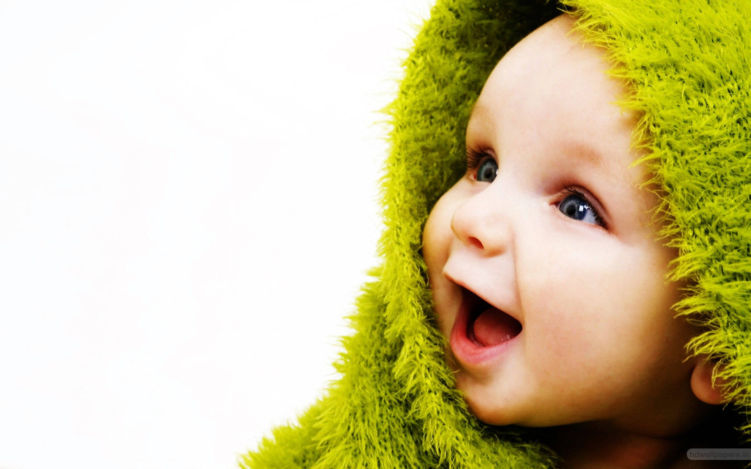 funny baby, fluffy lime green hood, bright blue eyes, 2K Desktop Wallpaper