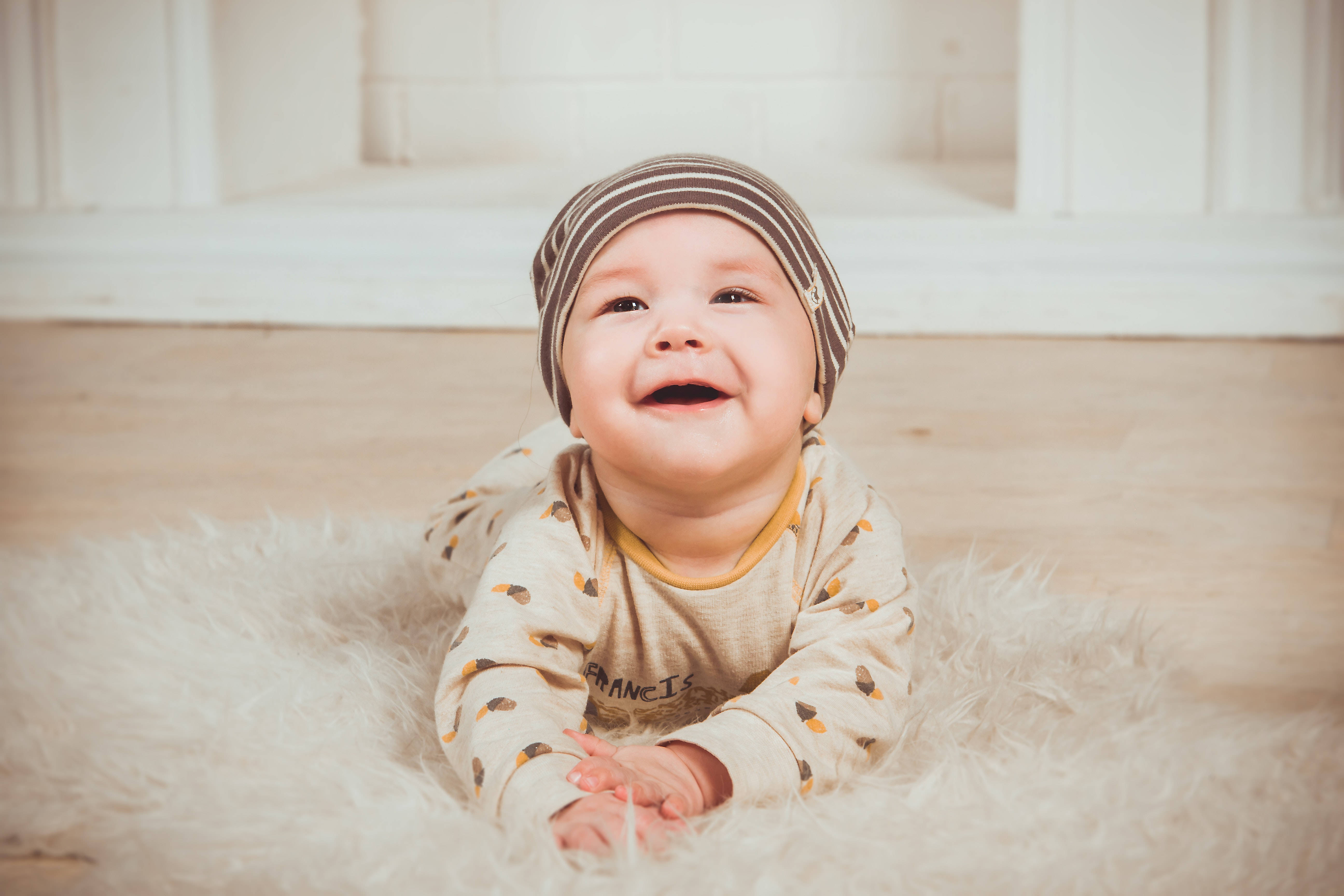 baby, striped hat, fluffy white rug, 5K Desktop Wallpaper