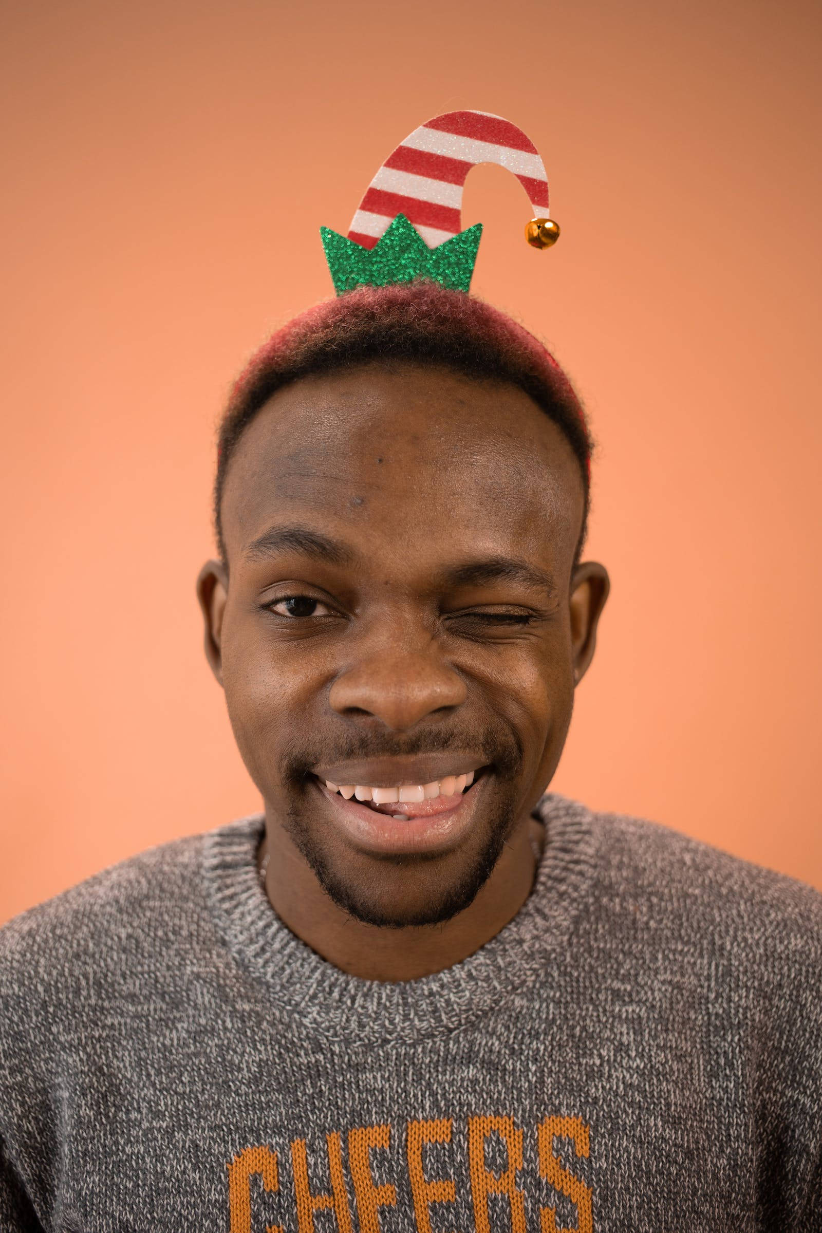 elf hat, red and white striped, winks playfully, Full HD Phone Wallpaper