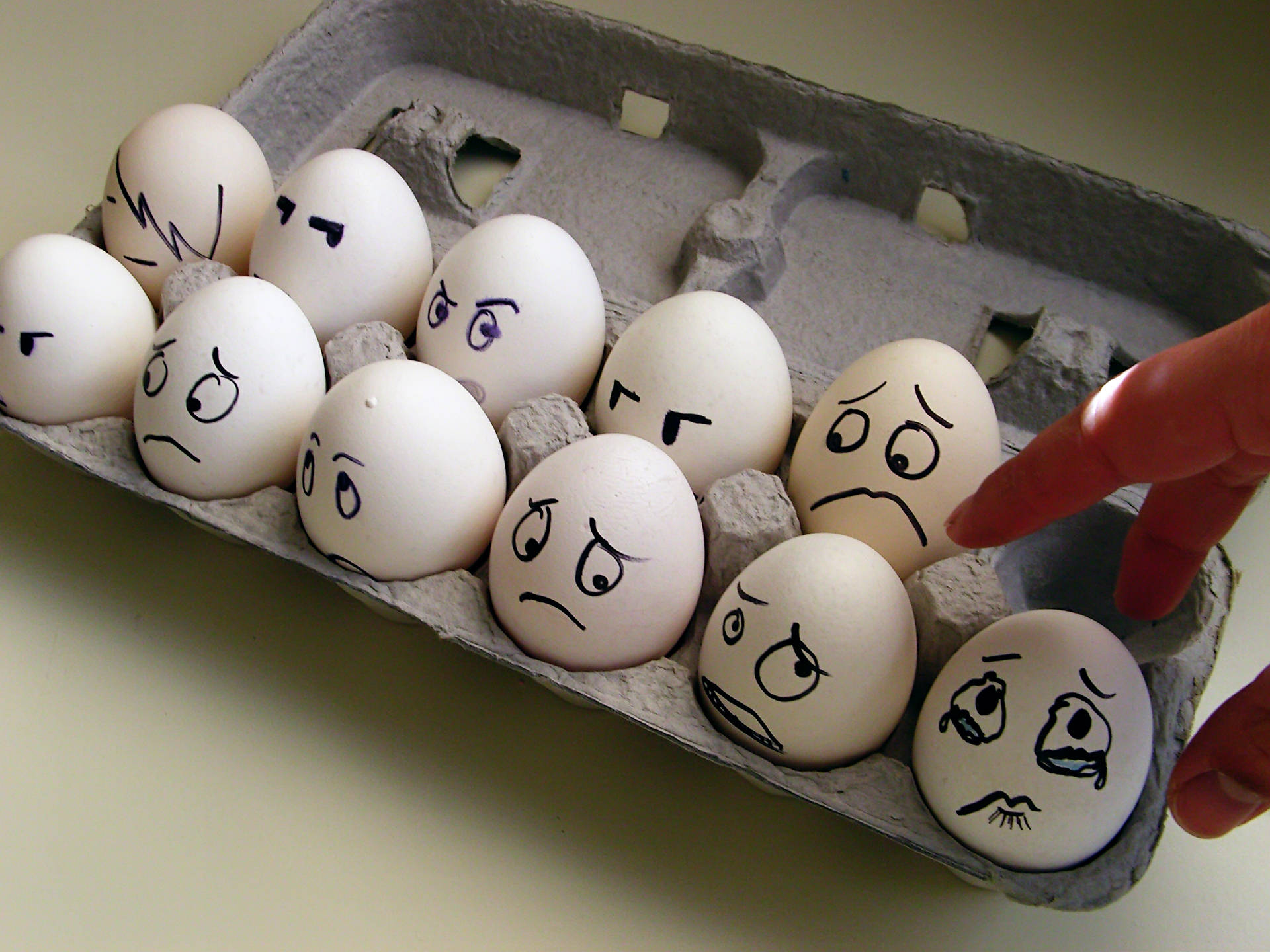 white eggs, sad faces, red finger, Full HD Desktop Wallpaper