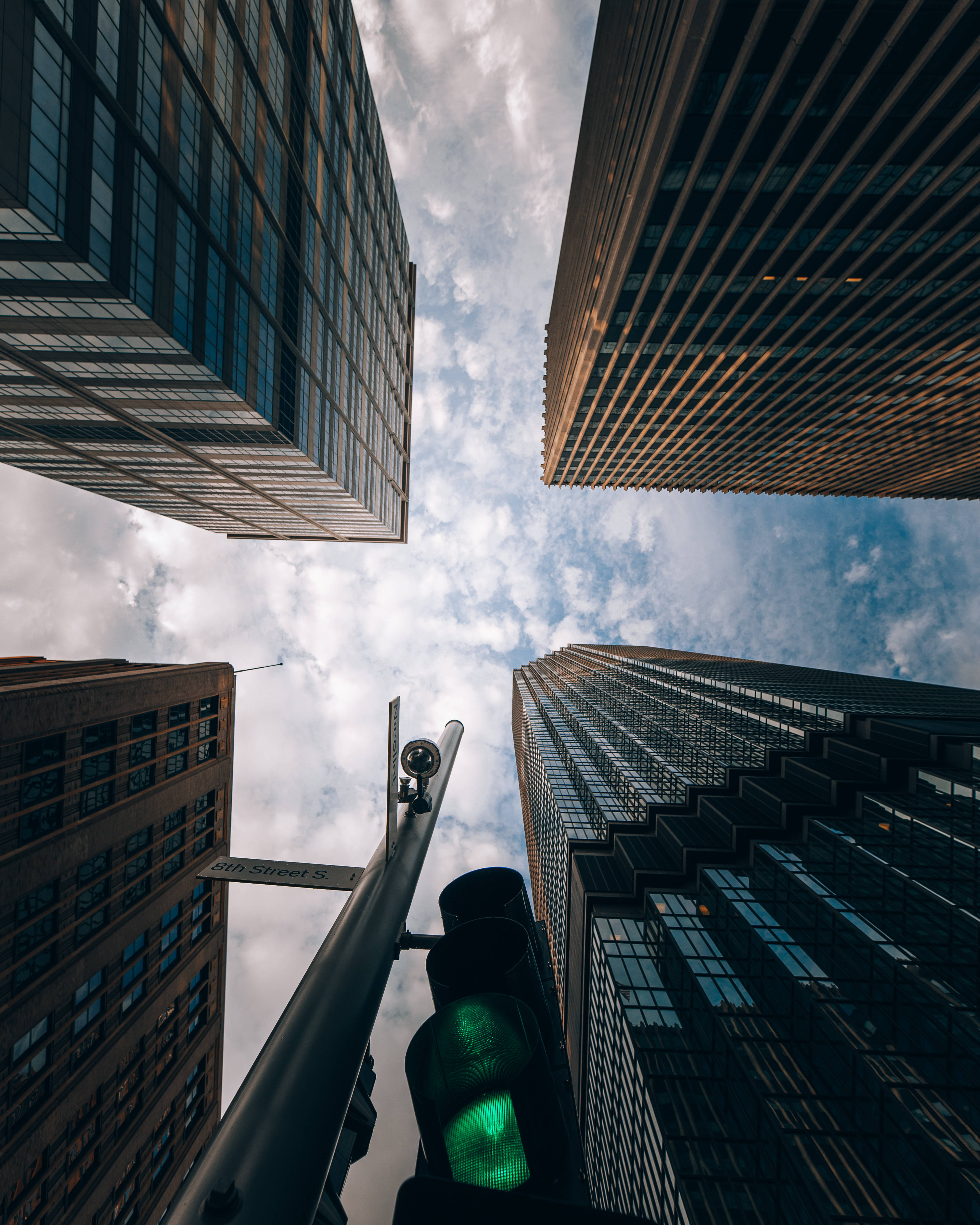Worm's-Eye View, futuristic city buildings, cloudy sky, 4K Phone Wallpaper