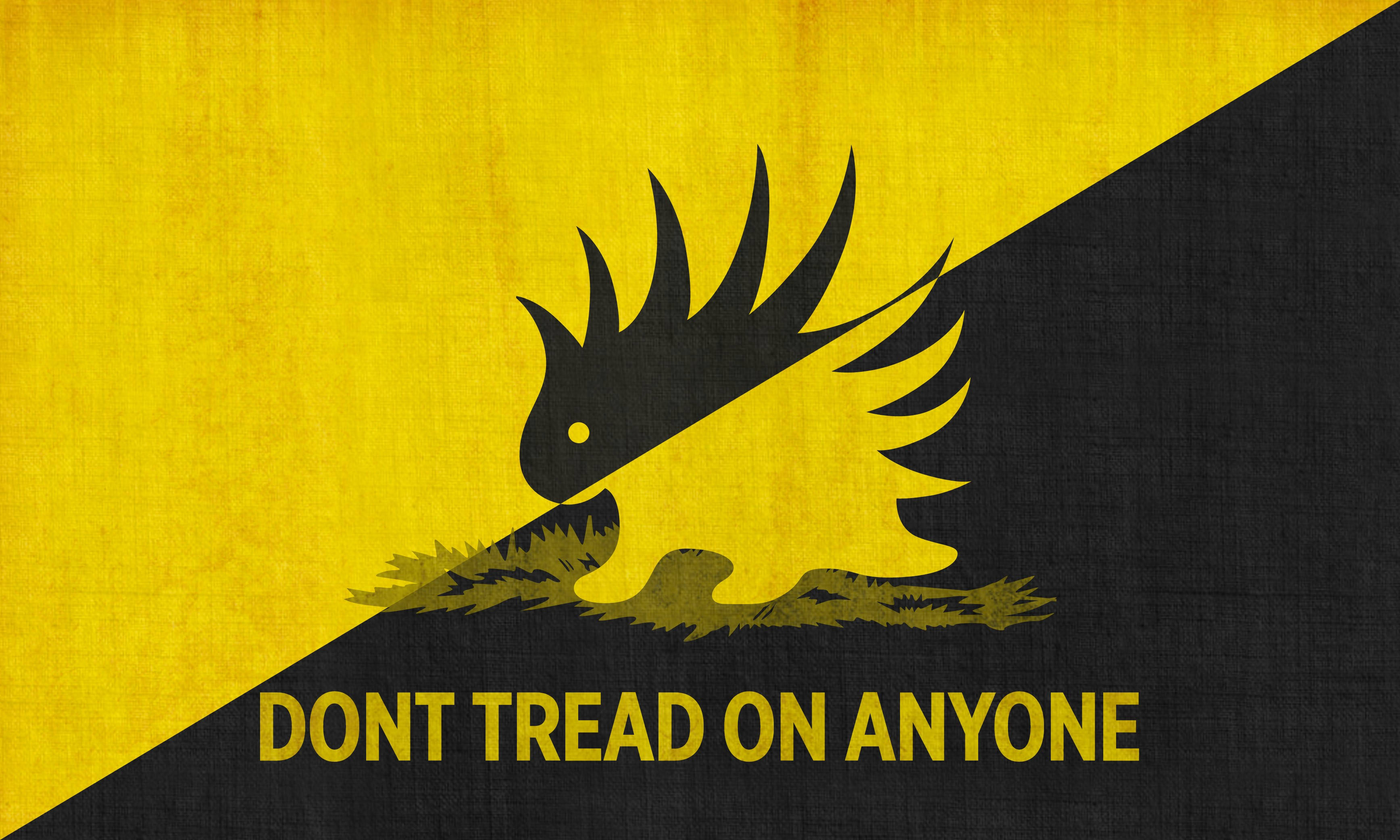 Gadsden Flag, black coiled rattlesnake, split yellow and black background, 2K Desktop Wallpaper