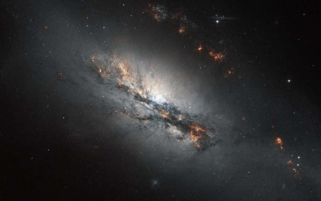 Galactic Center, spiral galaxy, glowing orange and white nebulae, SD Desktop Wallpaper