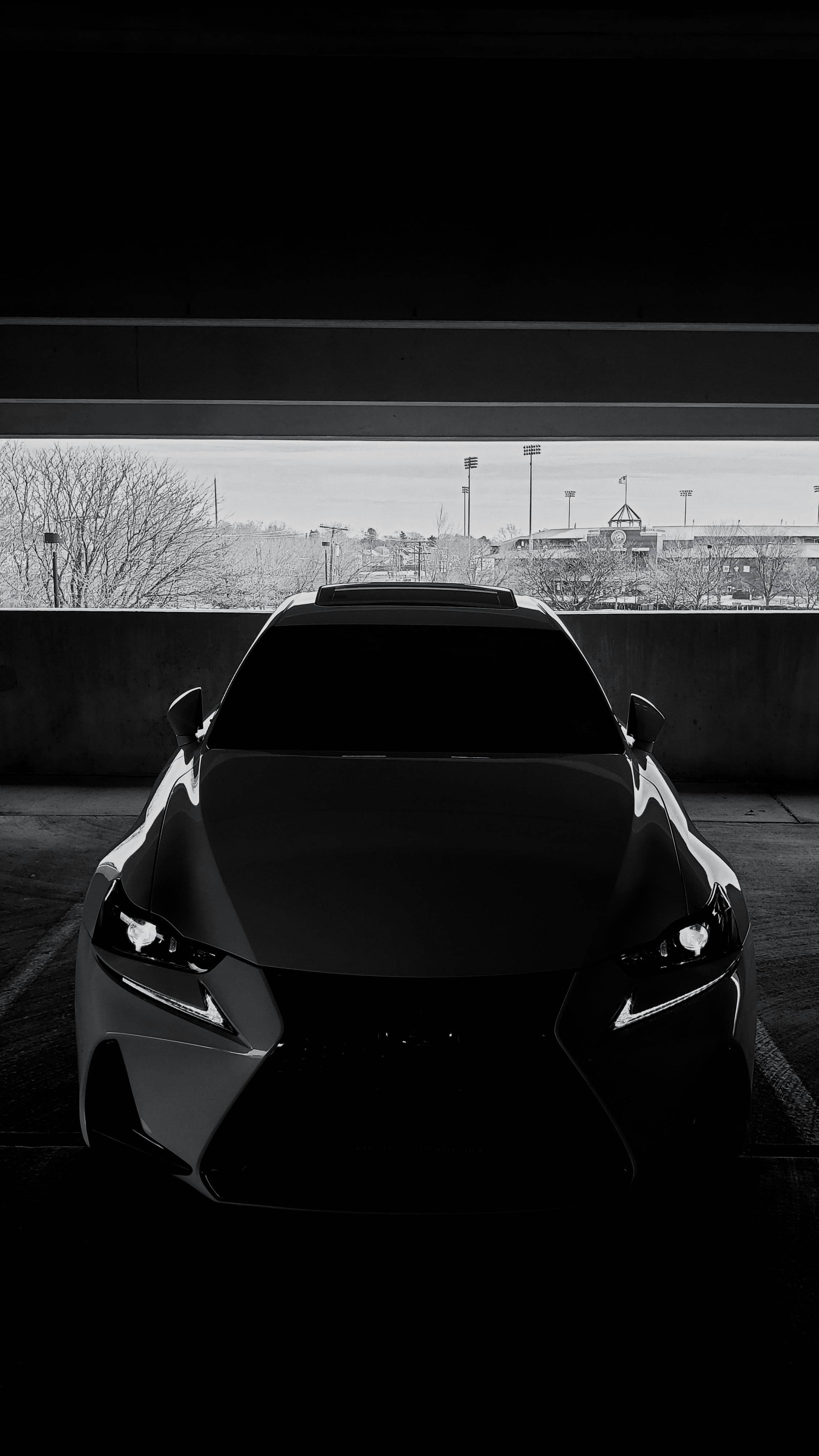Galaxy S10, sleek black sports car, concrete overpass, 4K Phone Wallpaper