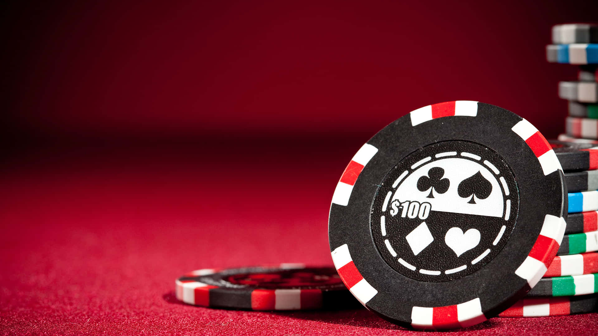 black $100 poker chip, red white border, suit symbols, Full HD Desktop Wallpaper
