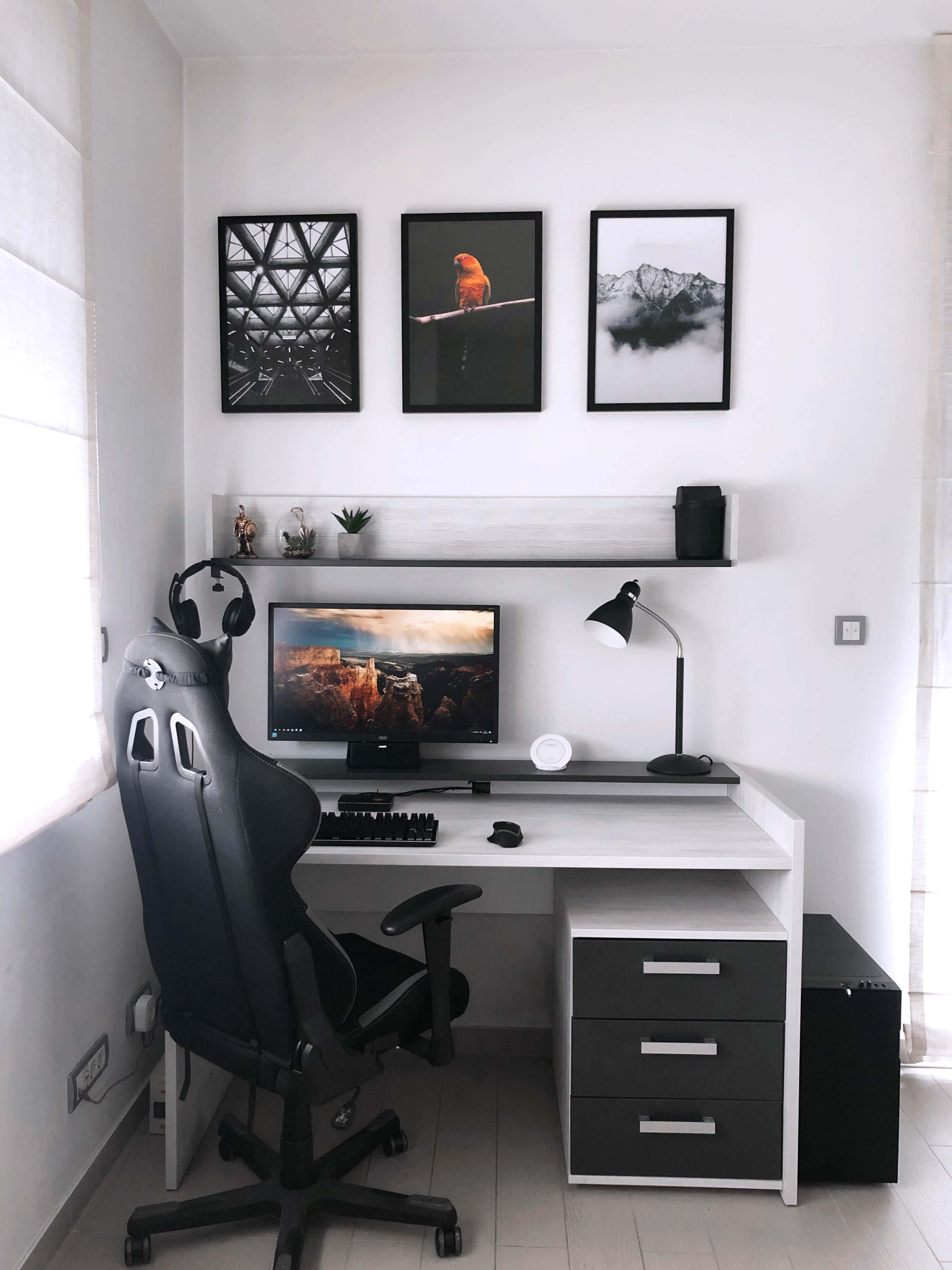 Minimalist home office, white desk, black gaming chair, 4K Phone Wallpaper