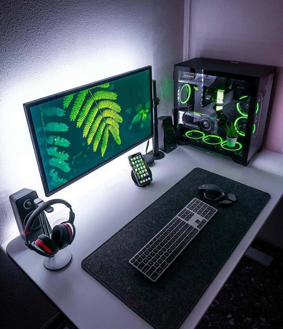 gaming setup, glowing green fern wallpaper, RGB-lit PC case, SD Phone Wallpaper