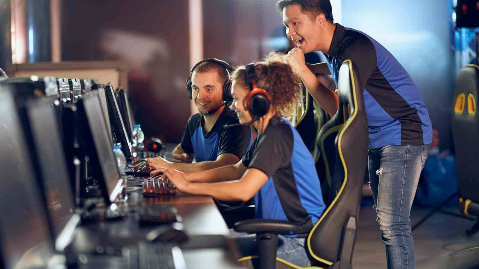 esports arena, blue jerseys, dimly lit, HD Desktop Wallpaper