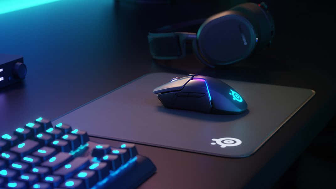 gaming mouse, glowing blue keyboard, neon lighting, SD Desktop Wallpaper
