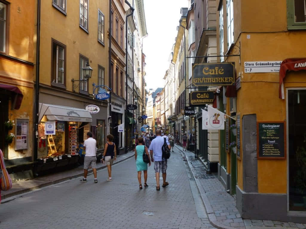Gamla Stan, cobblestone street, colorful historic buildings, SD Desktop Wallpaper