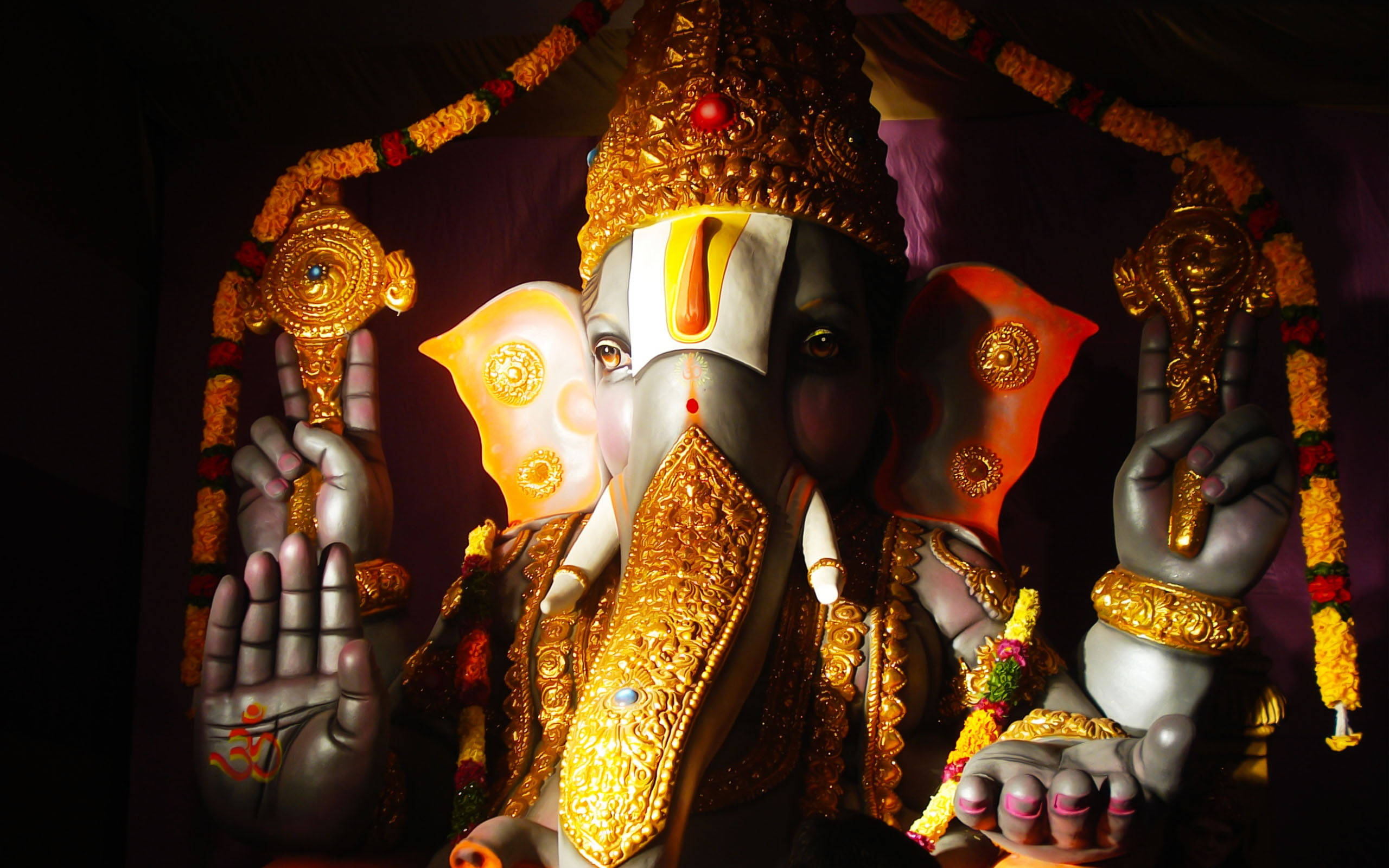 Ganesh, golden statue, floral garlands, 2K Desktop Wallpaper