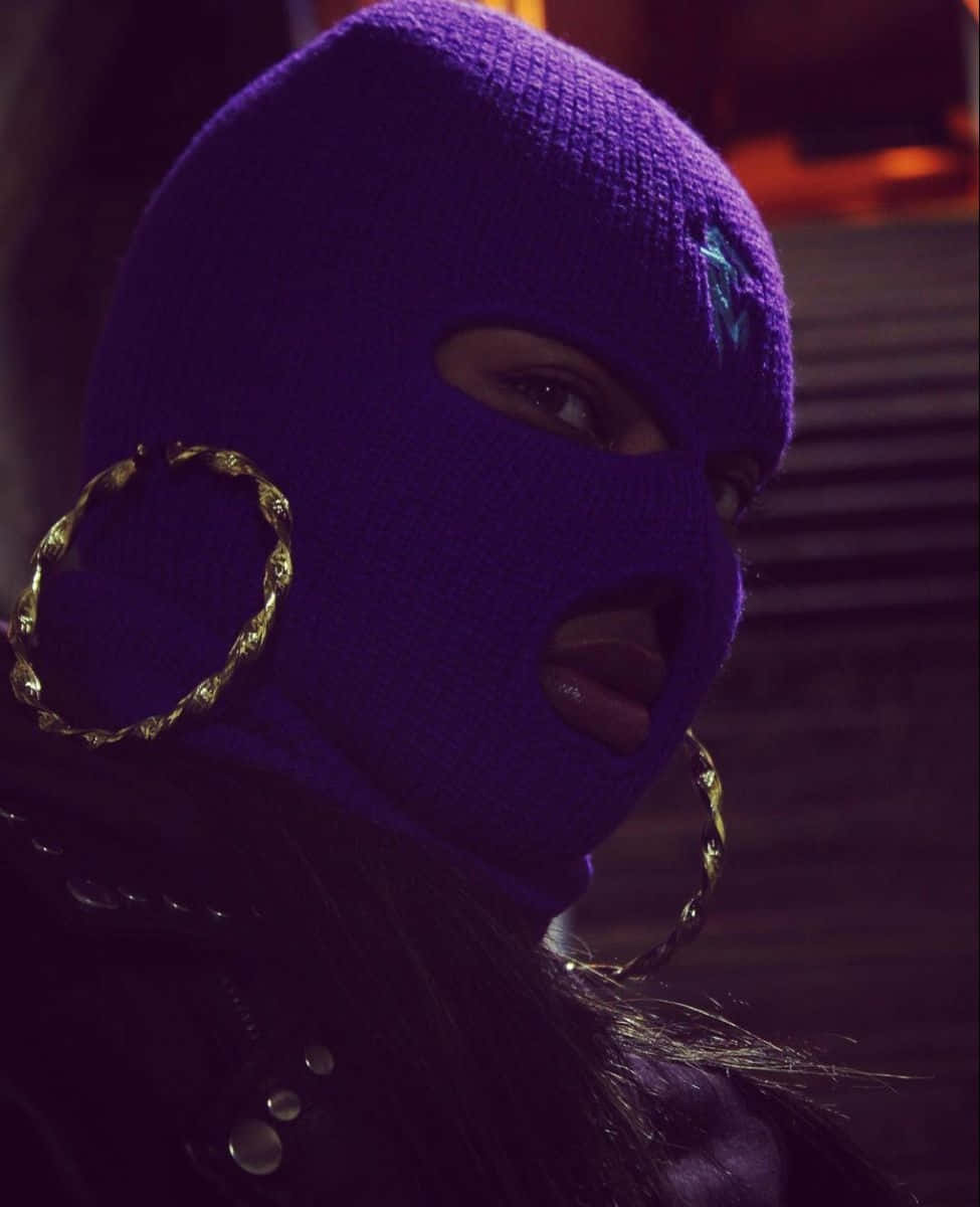 vibrant purple knit balaclava, glowing blue emblem, large gold hoop earrings, SD Phone Wallpaper