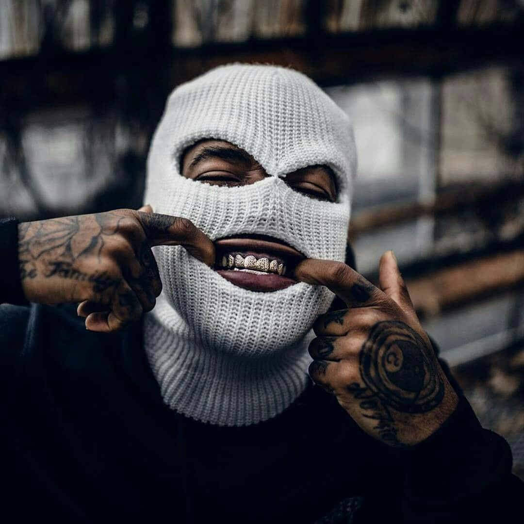 white knit balaclava, diamond-encrusted grillz, tattooed hands, SD Desktop Wallpaper