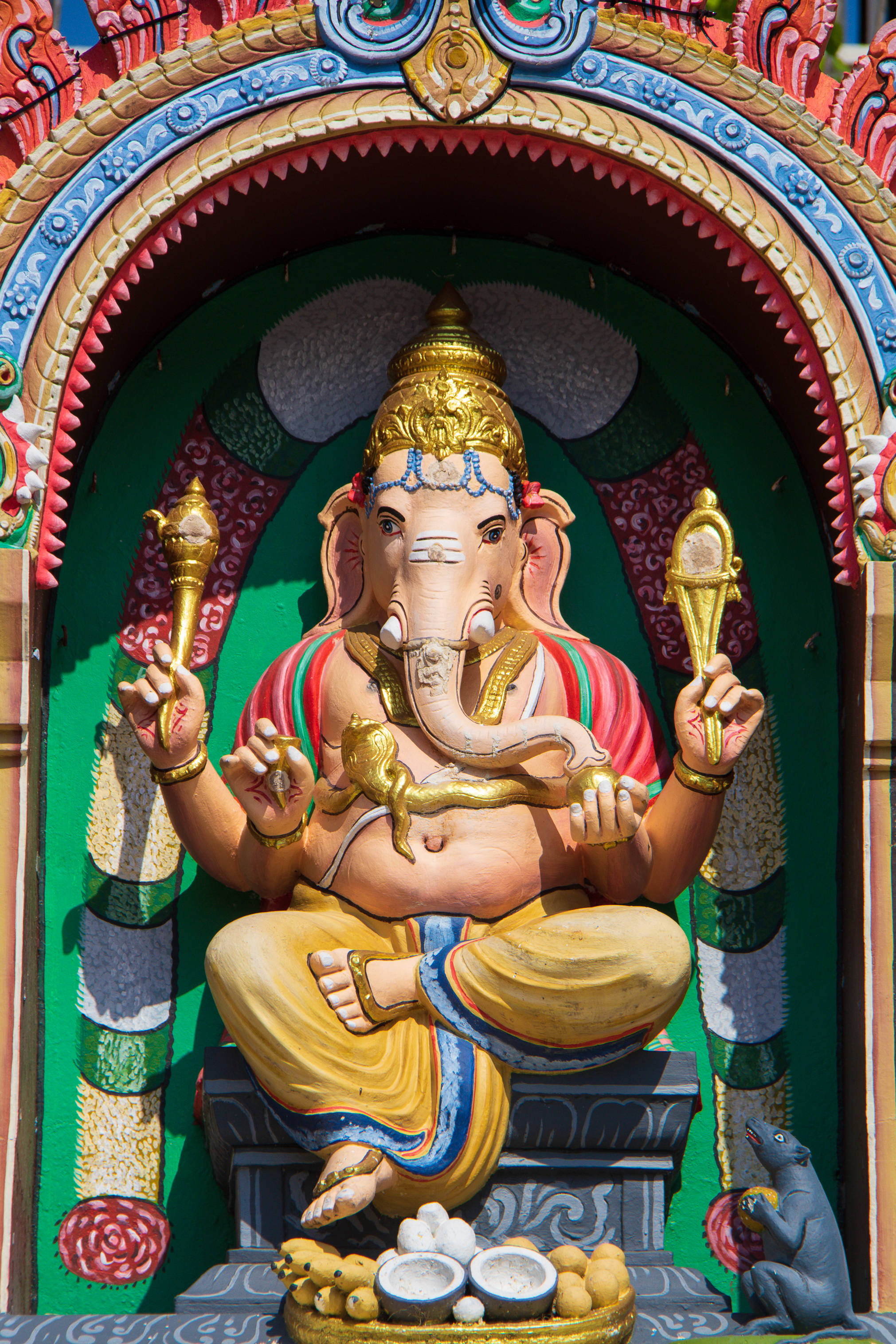 Ganpati Bappa, elephant-headed deity Ganesha, colorful ornate shrine, 2K Phone Wallpaper