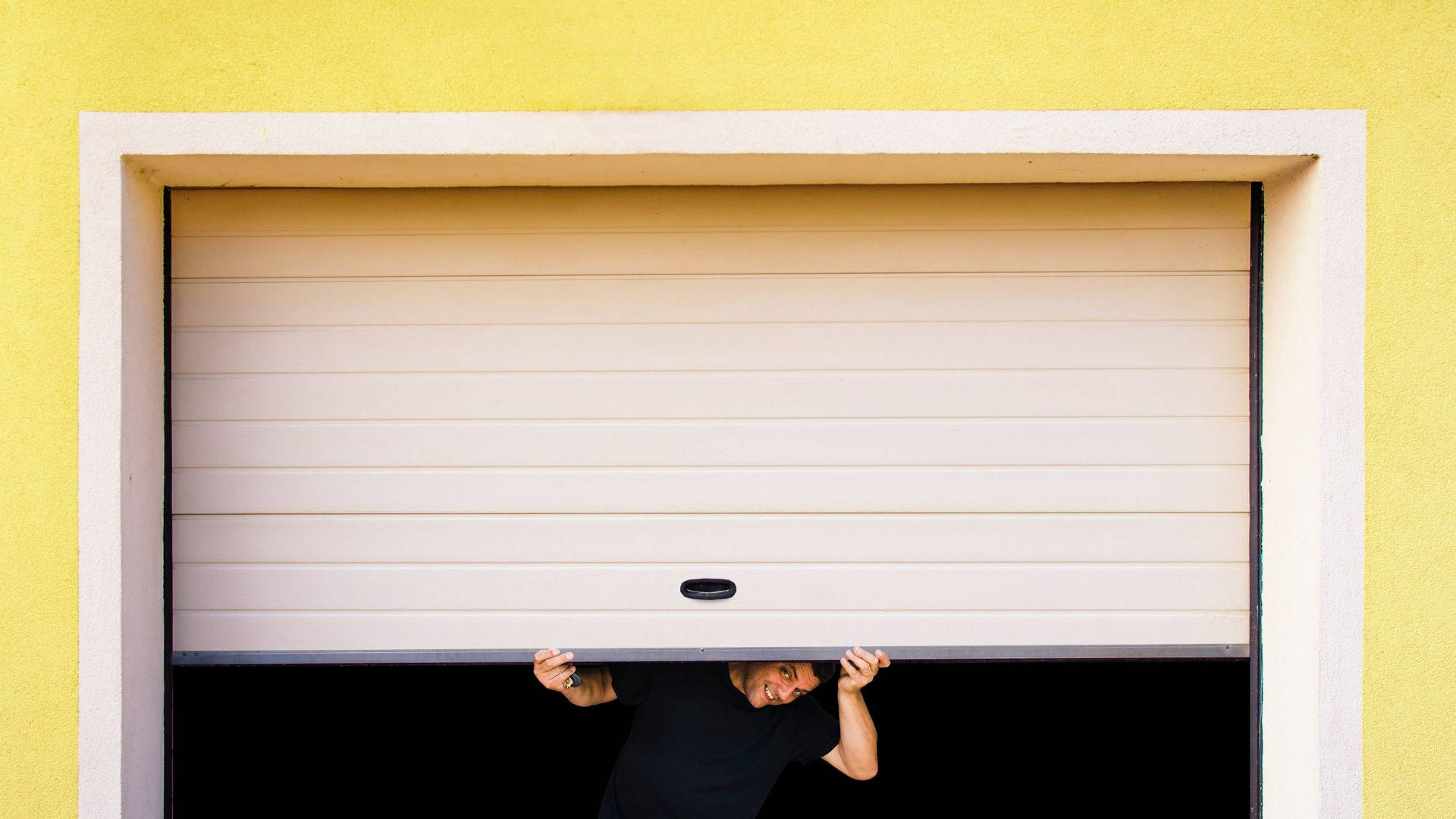 black shirt, beige garage door, vibrant yellow wall, Full HD Desktop Wallpaper