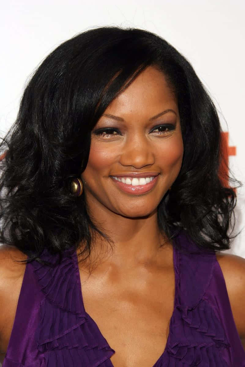 Garcelle Beauvais, voluminous black hair, ruffled purple top, SD Phone Wallpaper