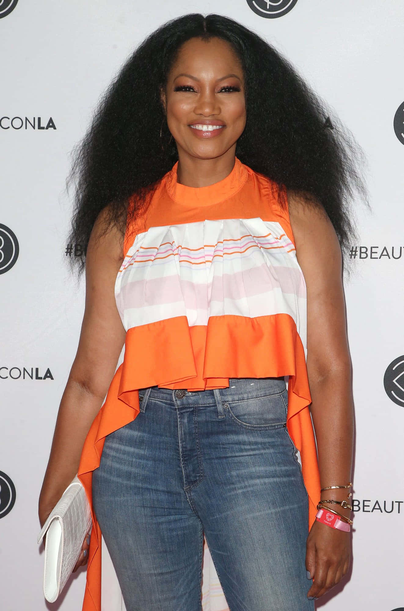Garcelle Beauvais, orange and white striped top, blue jeans, Full HD Phone Wallpaper