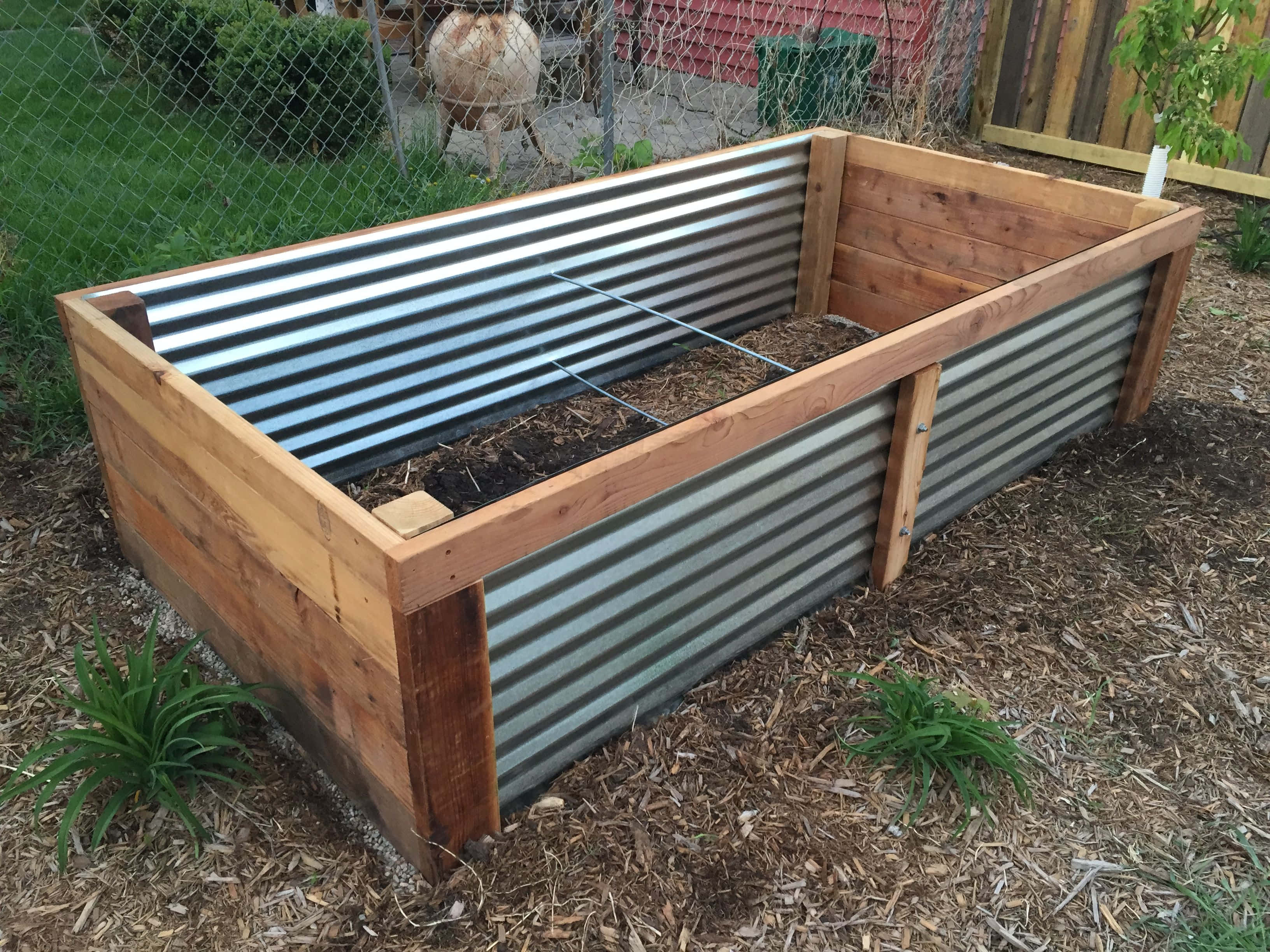 garden bed, wooden and corrugated metal raised garden bed, nutrient-rich soil, 2K Desktop Wallpaper