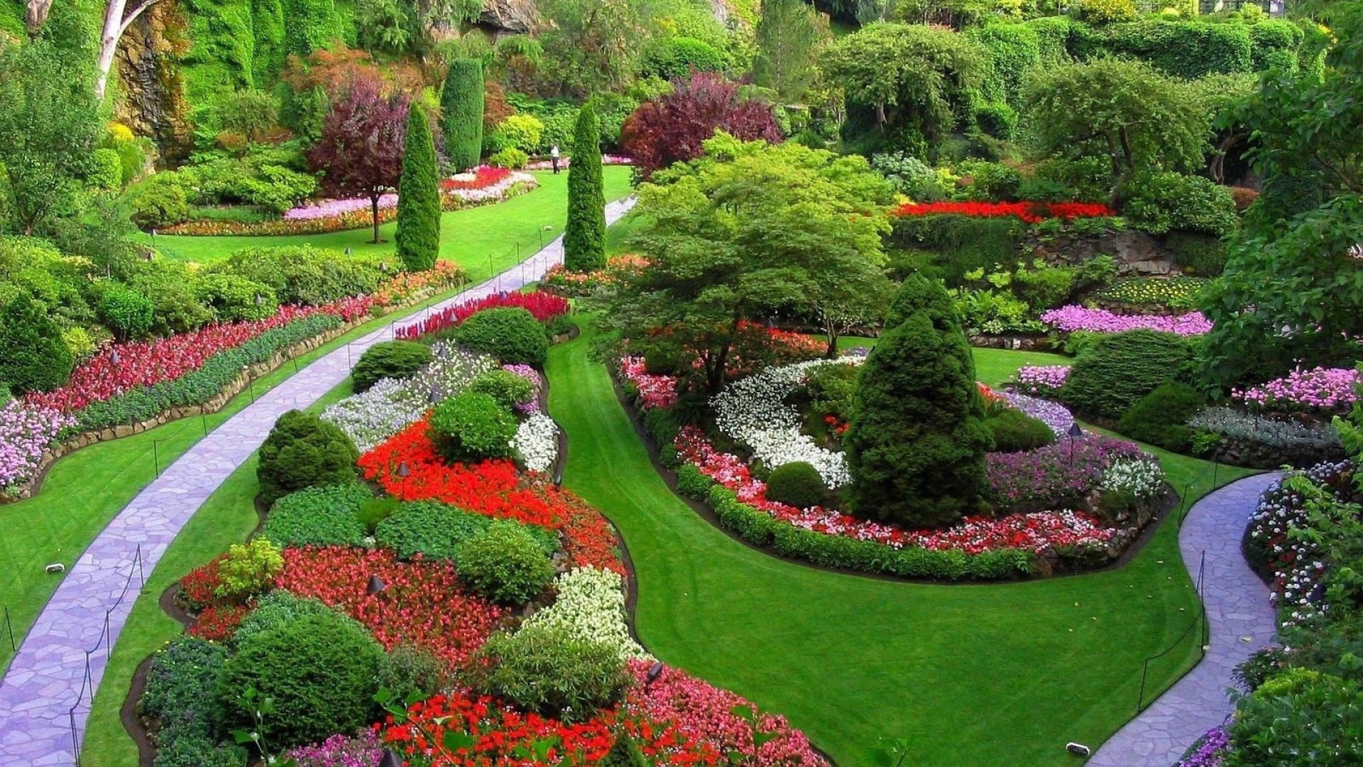 vibrant formal garden, winding stone paths, lush green lawns, Full HD Desktop Wallpaper