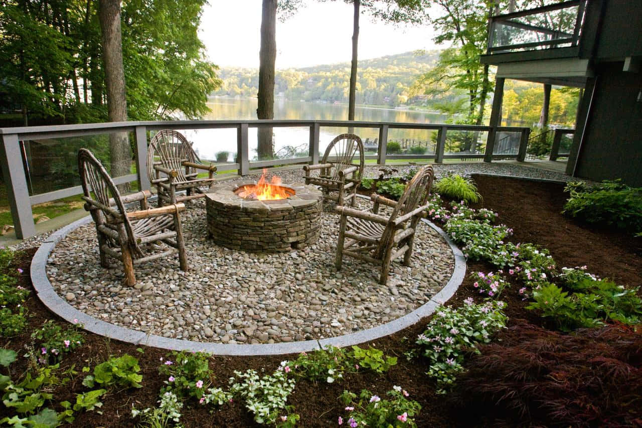 stone fire pit, flickering flames, gravel circle, HD Desktop Wallpaper
