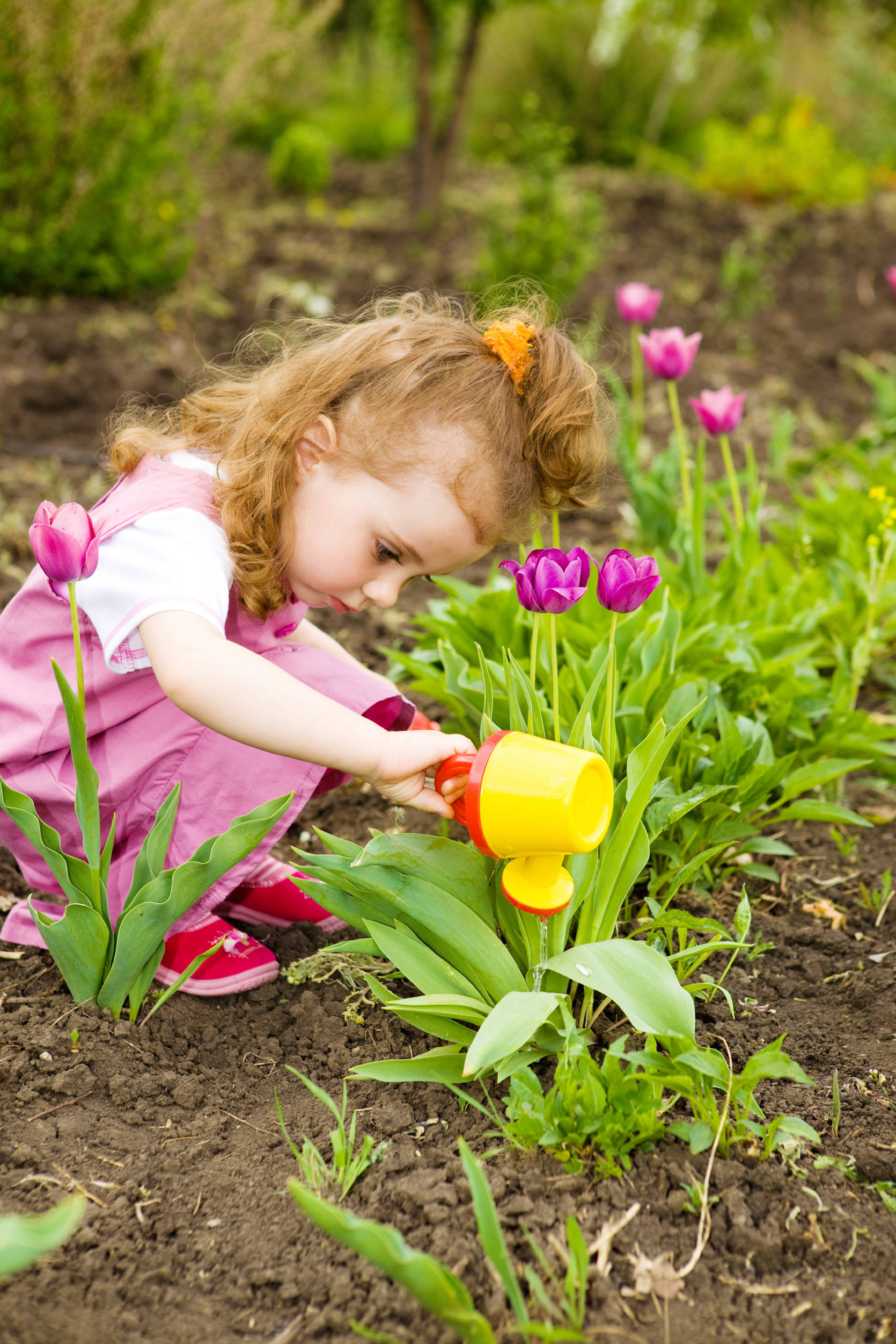 little girl, pink overalls, garden bed, 2K Phone Wallpaper