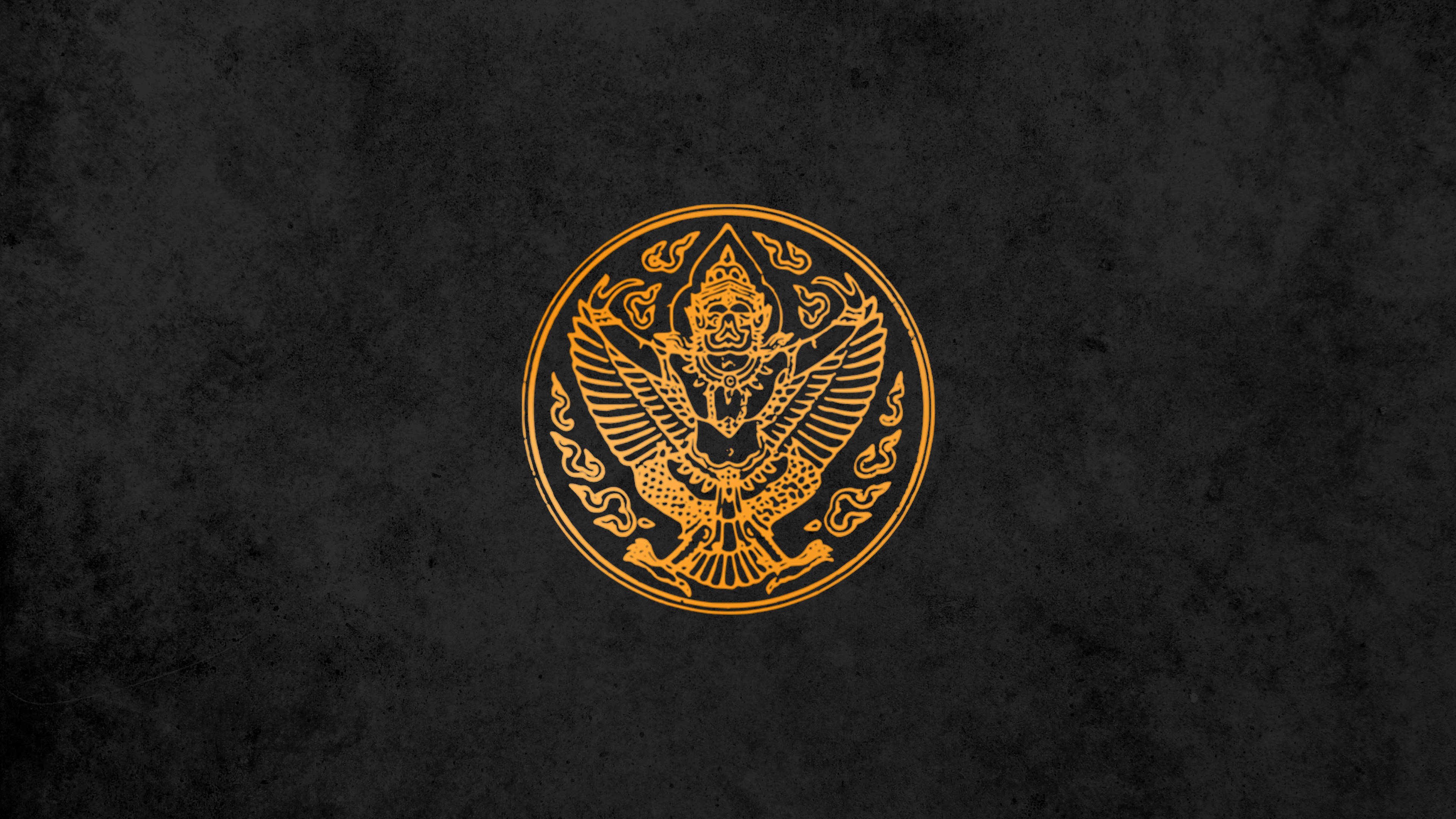 Garuda emblem, golden ornate, textured dark gray background, 4K Desktop Wallpaper