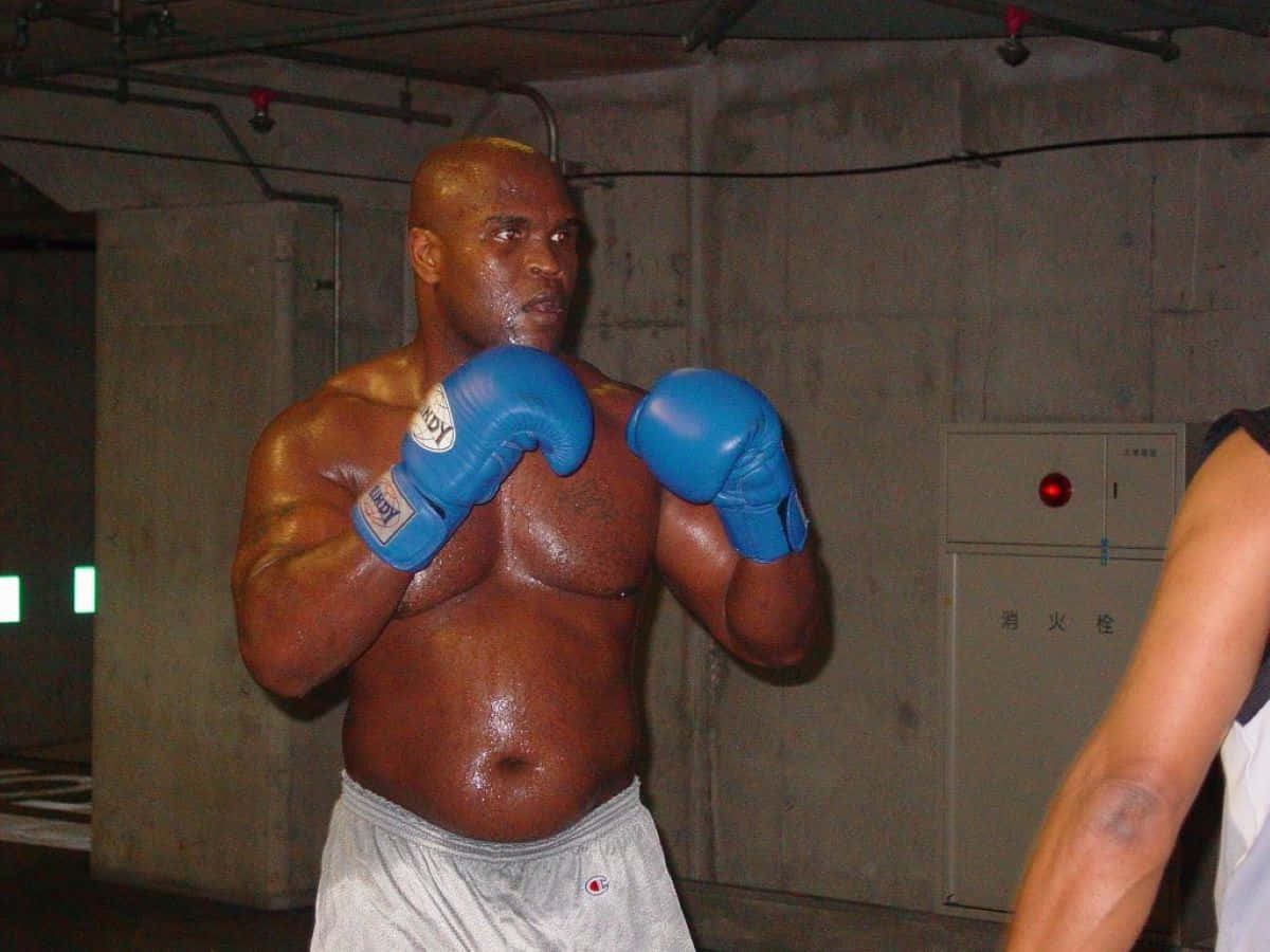 Gary Goodridge, blue gloves, grey shorts, SD Desktop Wallpaper