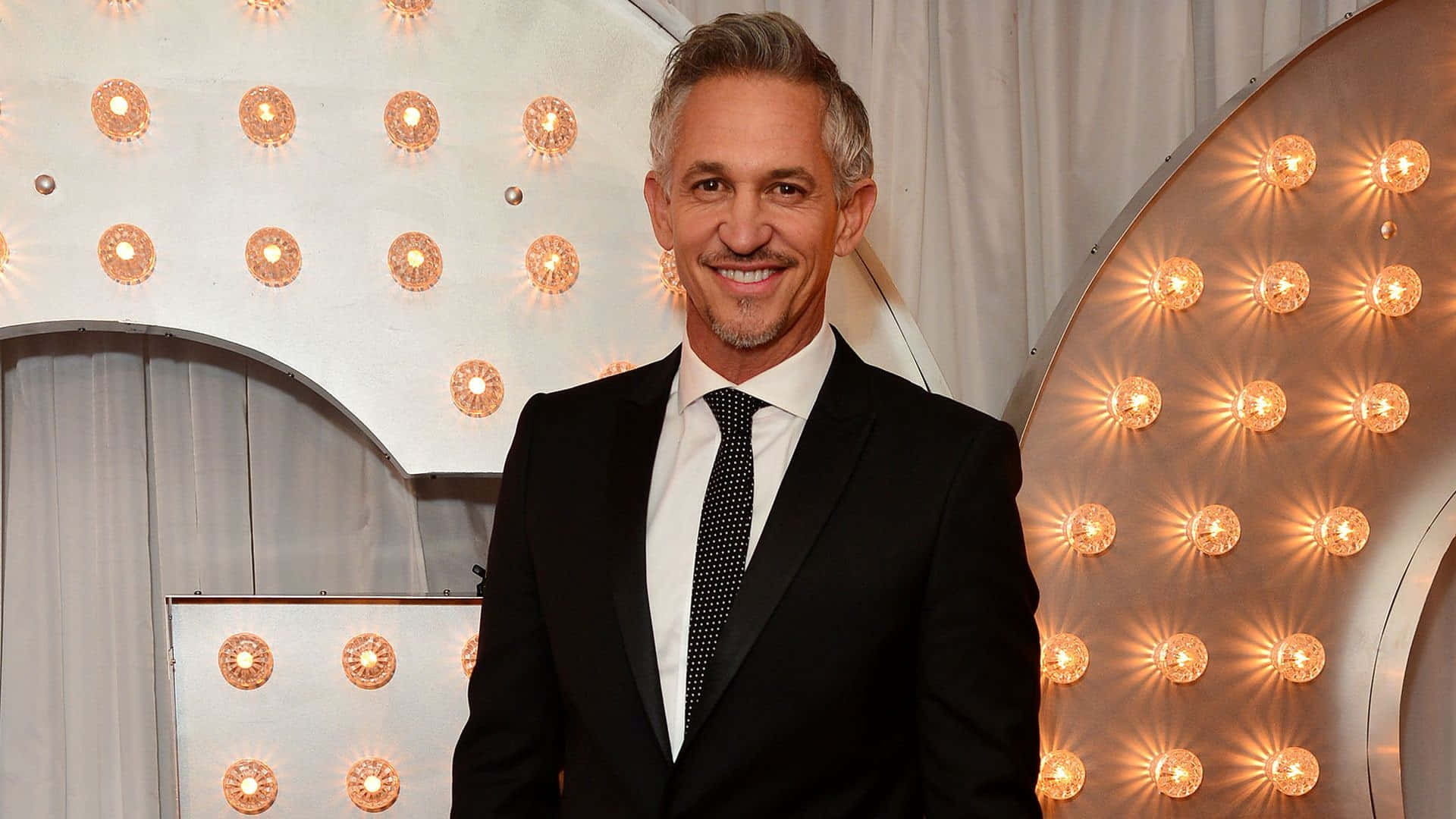 Gary Lineker, black suit, polka dot tie, Full HD Desktop Wallpaper