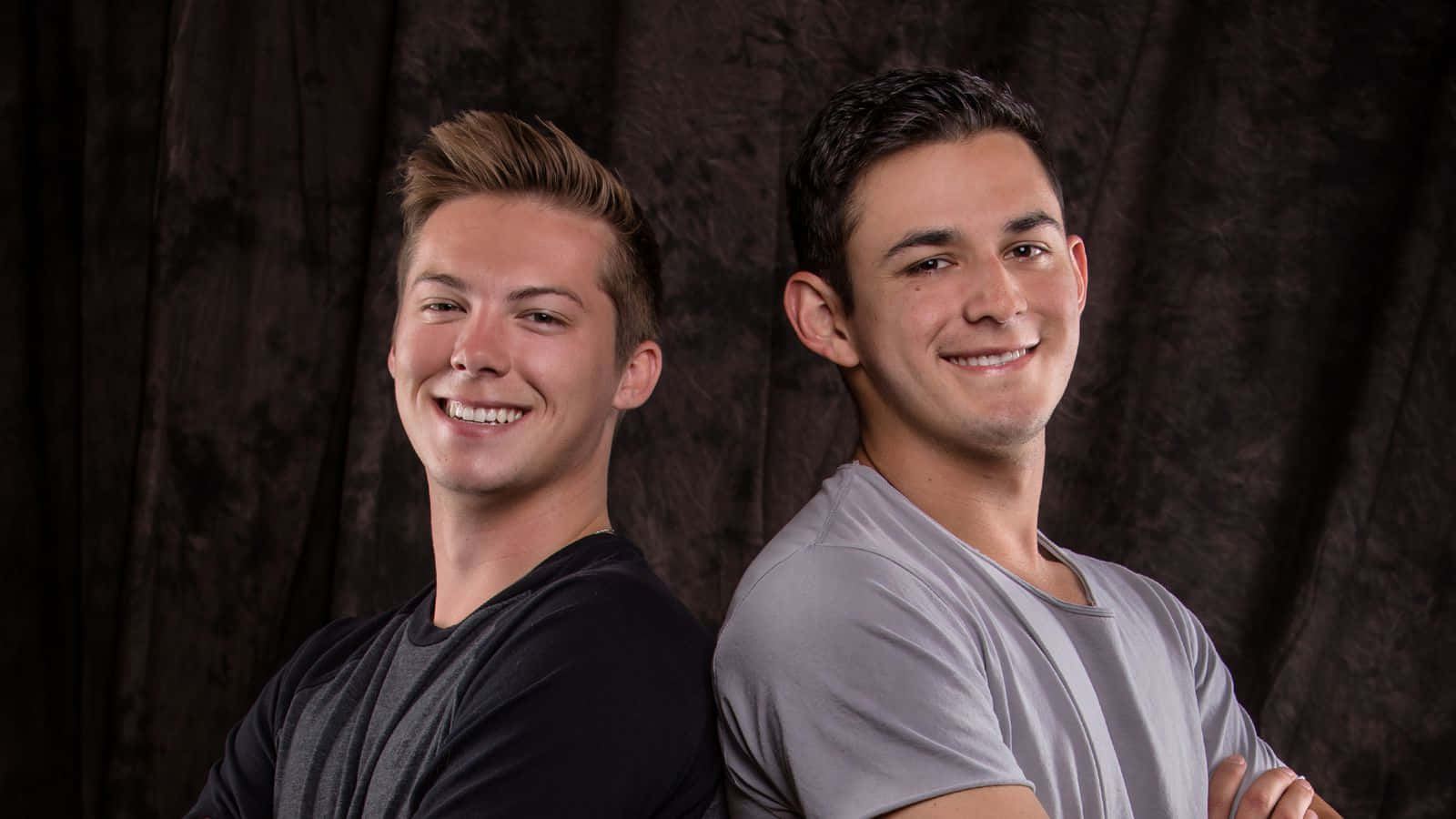 studio portrait, dark textured curtain, two smiling young men, HD Desktop Wallpaper