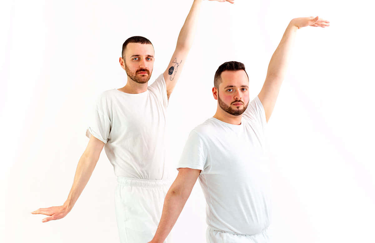 white outfits, arms raised, plain white background, SD Desktop Wallpaper