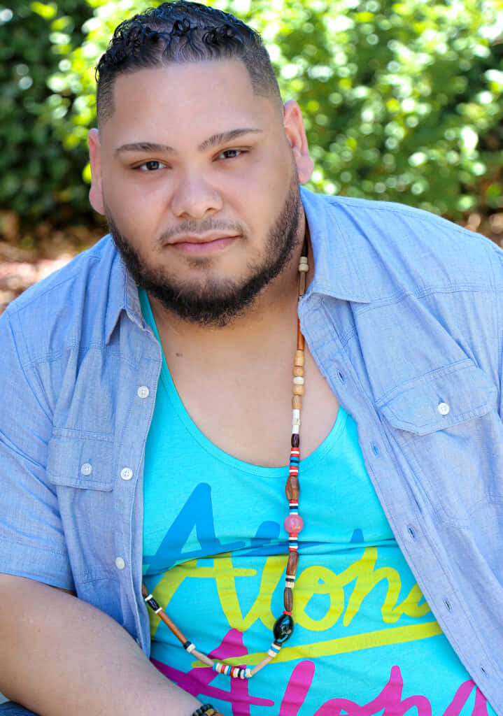 Gay Latino man, blue shirt, bright turquoise tank top, SD Phone Wallpaper