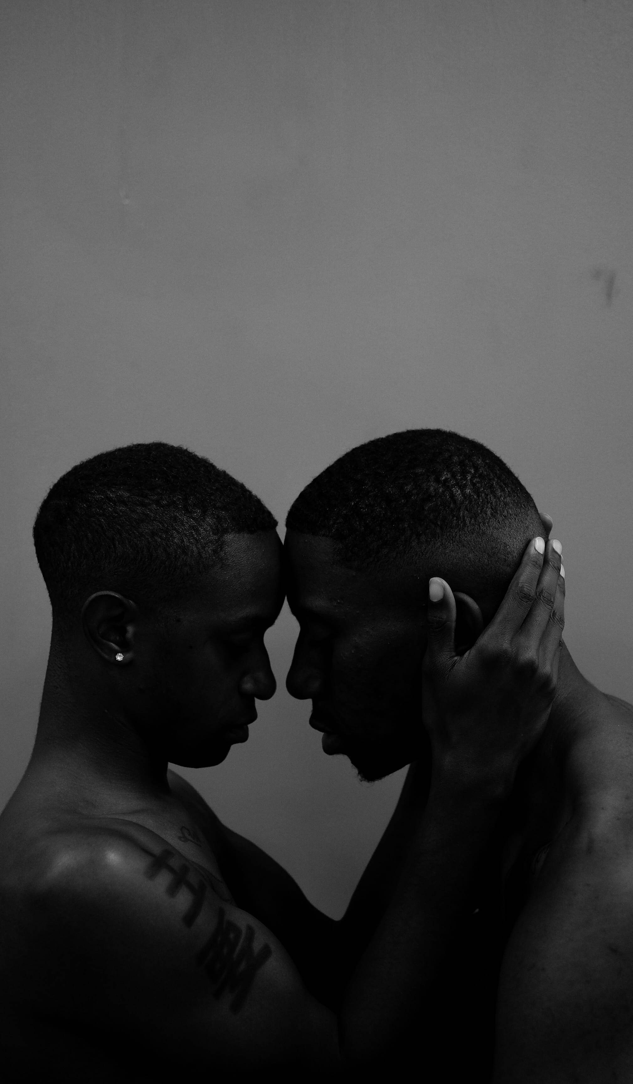 black and white portrait, plain wall, shirtless men, 2K Phone Wallpaper