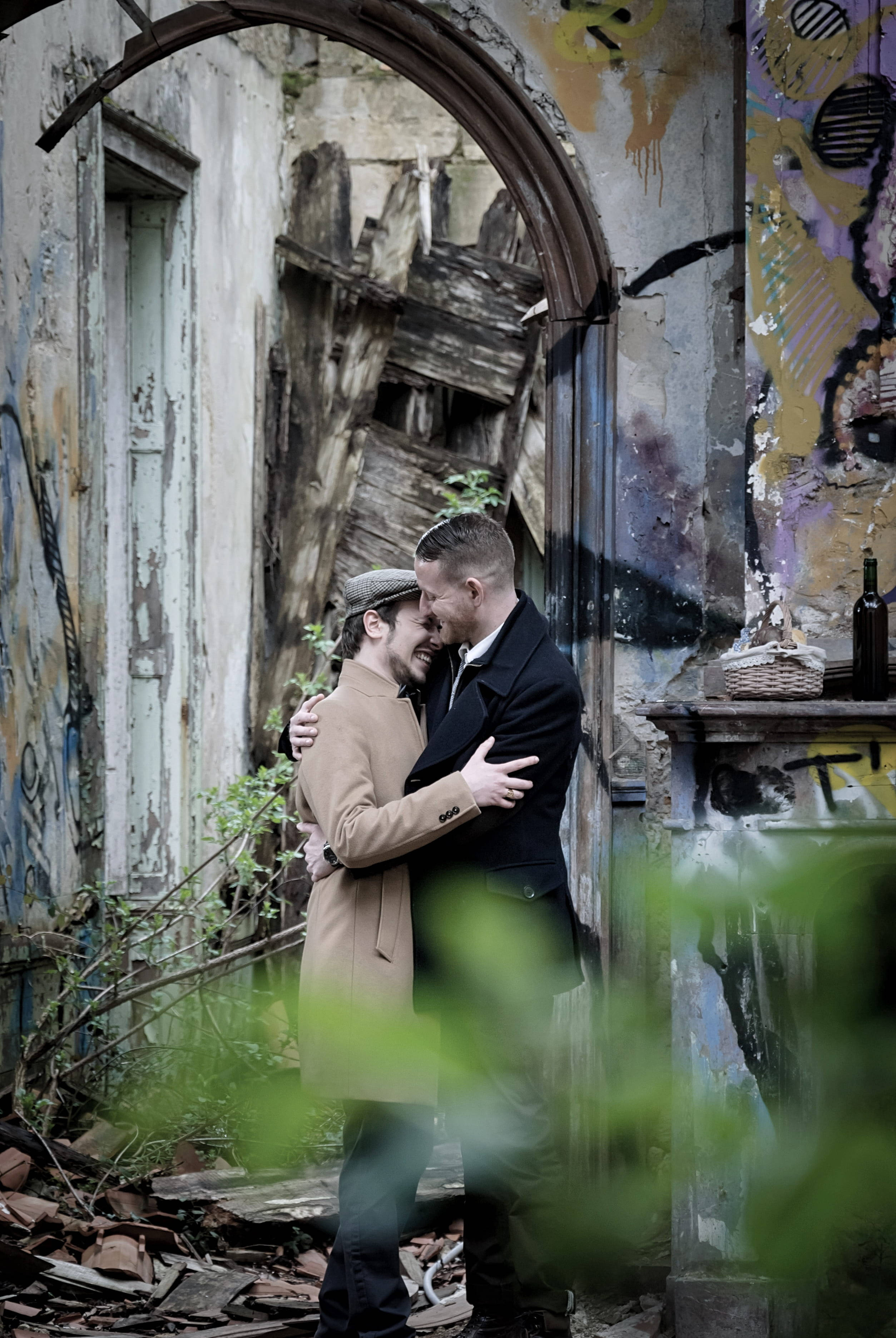 crumbling ruins, graffiti-covered abandoned building, overgrown foliage, 2K Phone Wallpaper