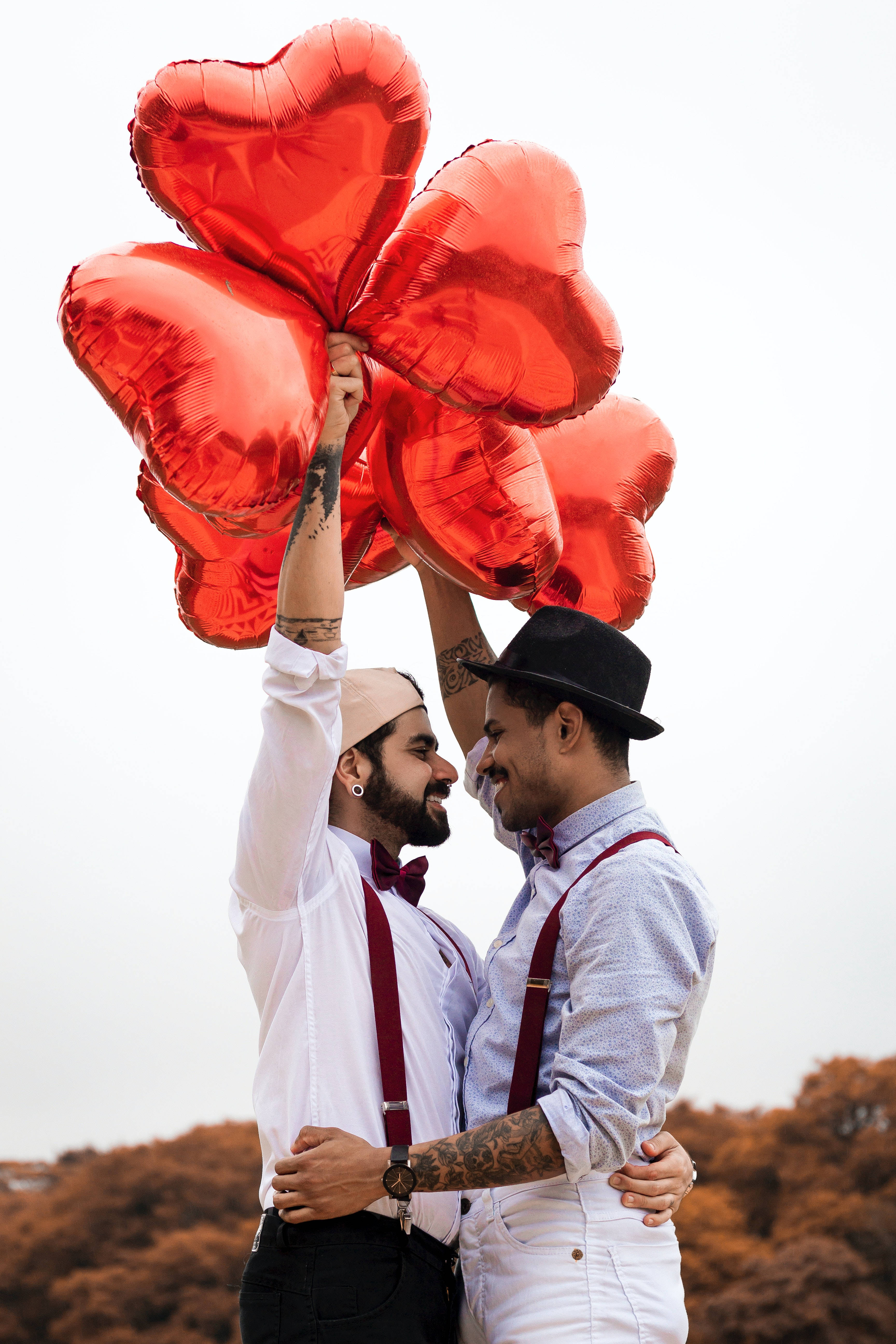 shiny red heart balloons, white shirts, suspenders, 5K Phone Wallpaper