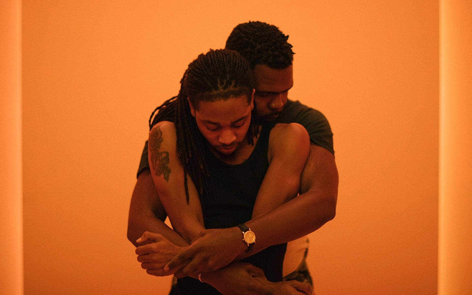 Gay Men Hugs, orange room, softly lit, Full HD Desktop Wallpaper
