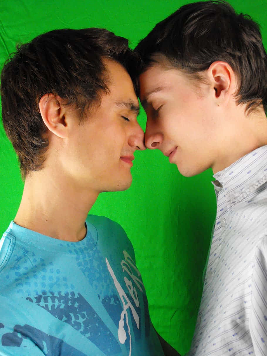 green screen background, two young men, foreheads touching, SD Phone Wallpaper
