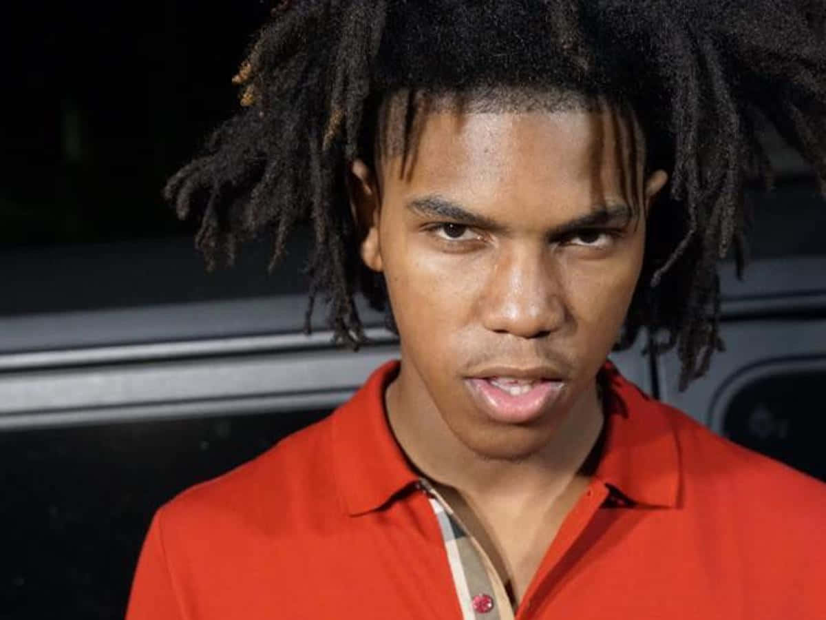 Gee Money, dark dreadlocks, bright red polo shirt, SD Desktop Wallpaper