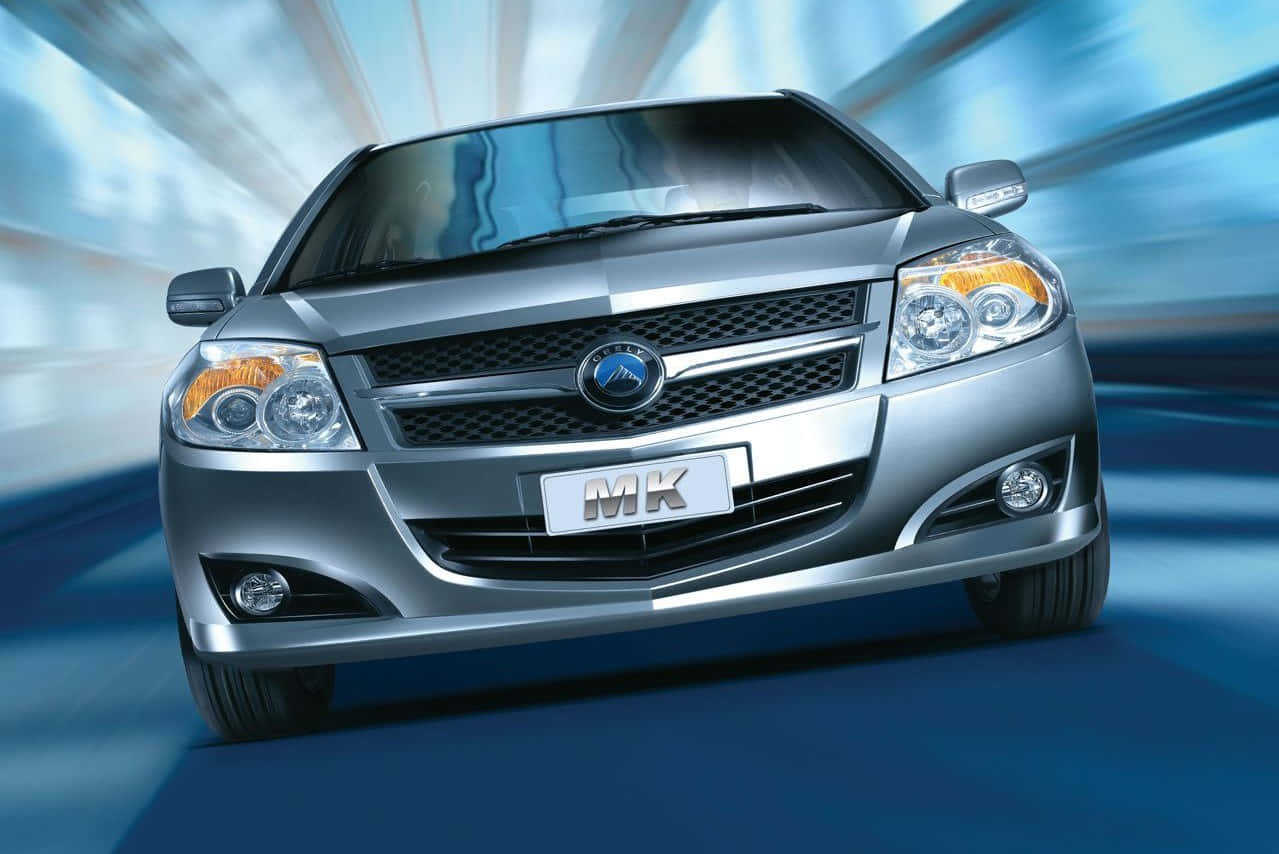 Geely, sleek silver sedan, scenic mountain road, SD Desktop Wallpaper