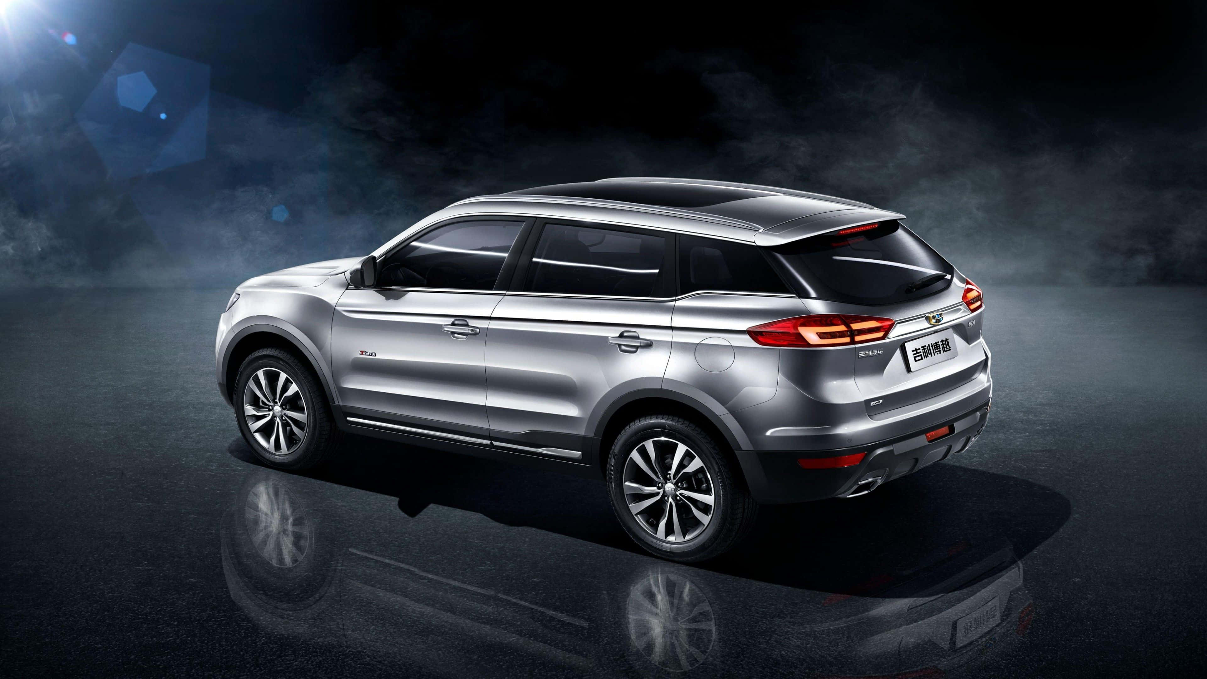 Geely, sleek silver SUV, studio setting, 4K Desktop Wallpaper
