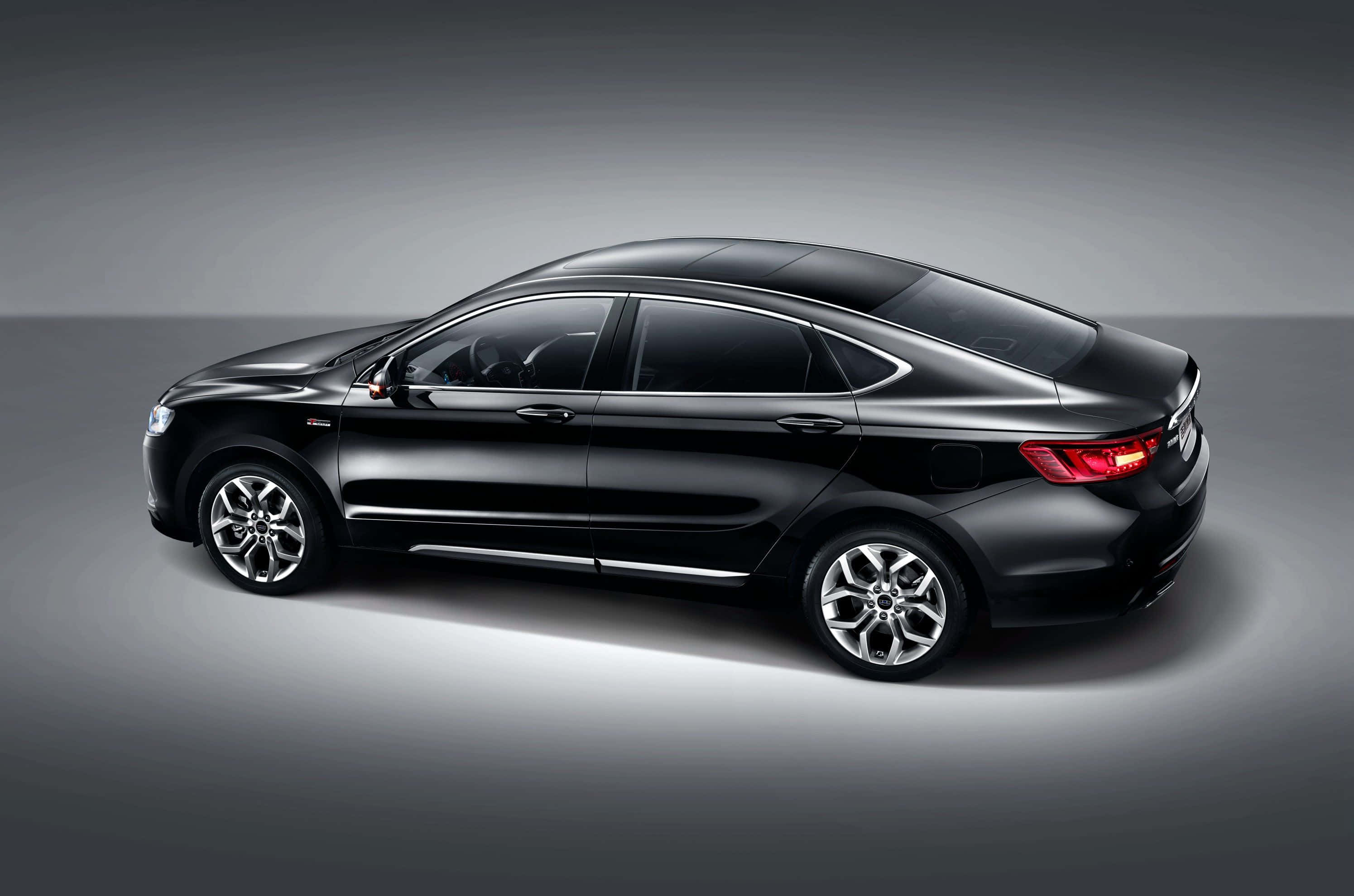 Geely, sleek black sedan, chrome accents, 2K Desktop Wallpaper
