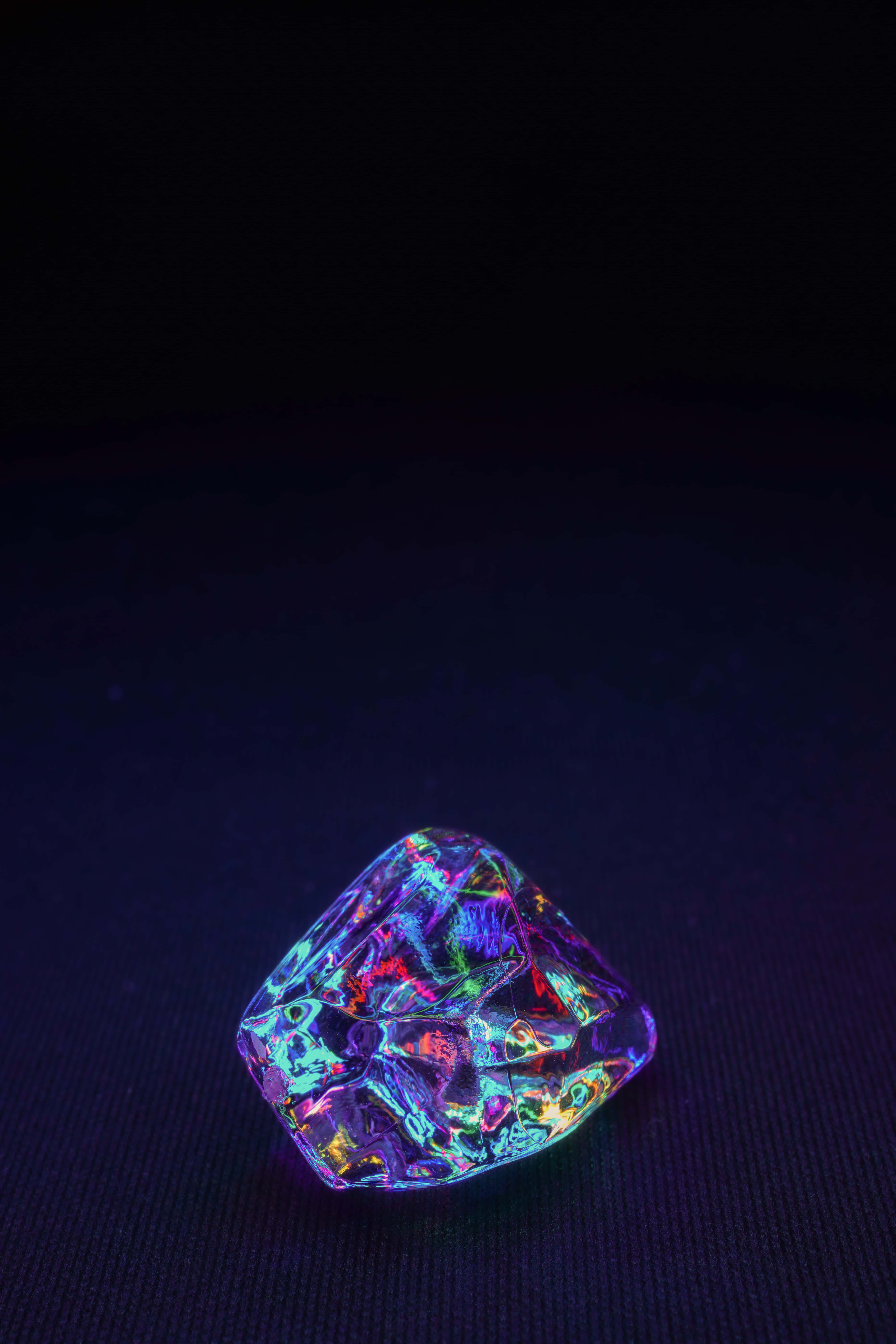 bismuth surface gemstone, faceted crystal gemstone, vibrant rainbow hues, 8K Phone Wallpaper