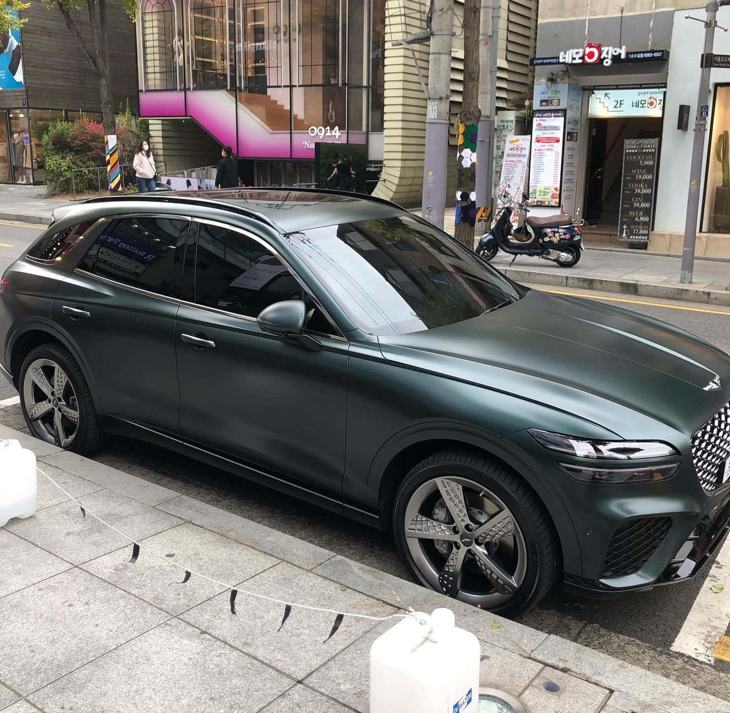 Genesis GV70, matte dark green, city sidewalk, HD Desktop Wallpaper