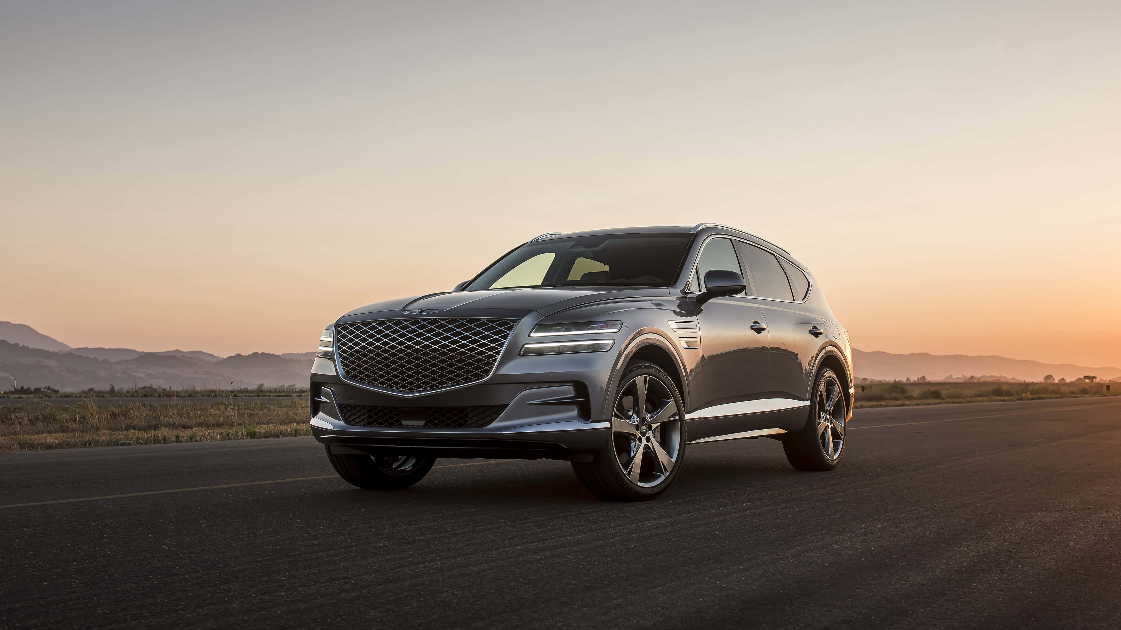 Genesis GV80, sleek silver SUV, desert road, 4K Desktop Wallpaper
