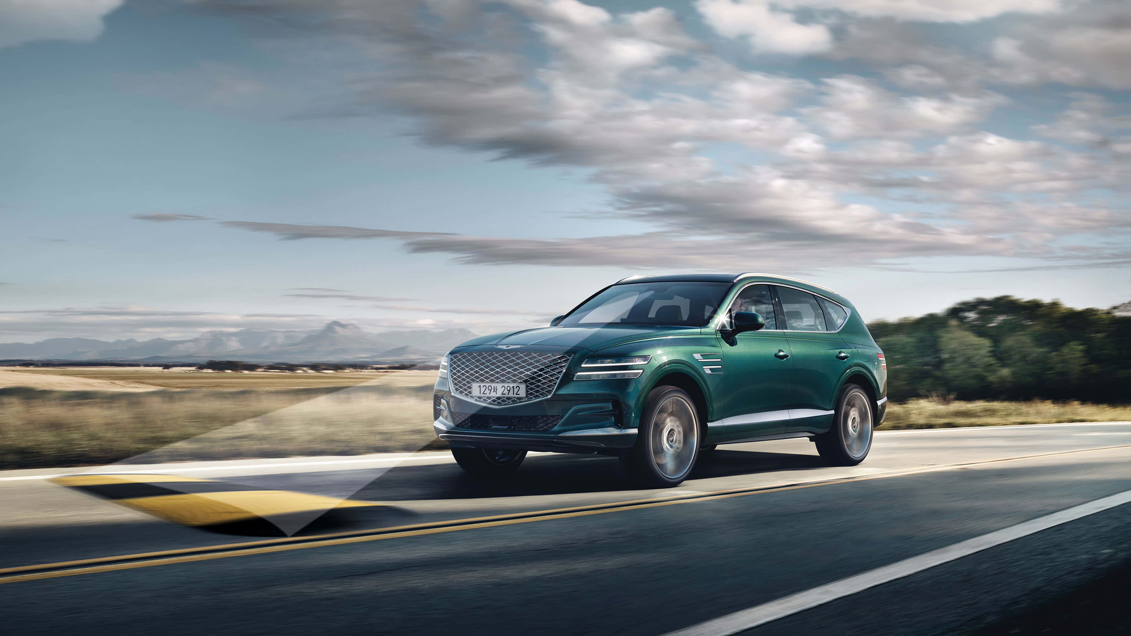 Genesis GV80, sleek green, winding road, 4K Desktop Wallpaper