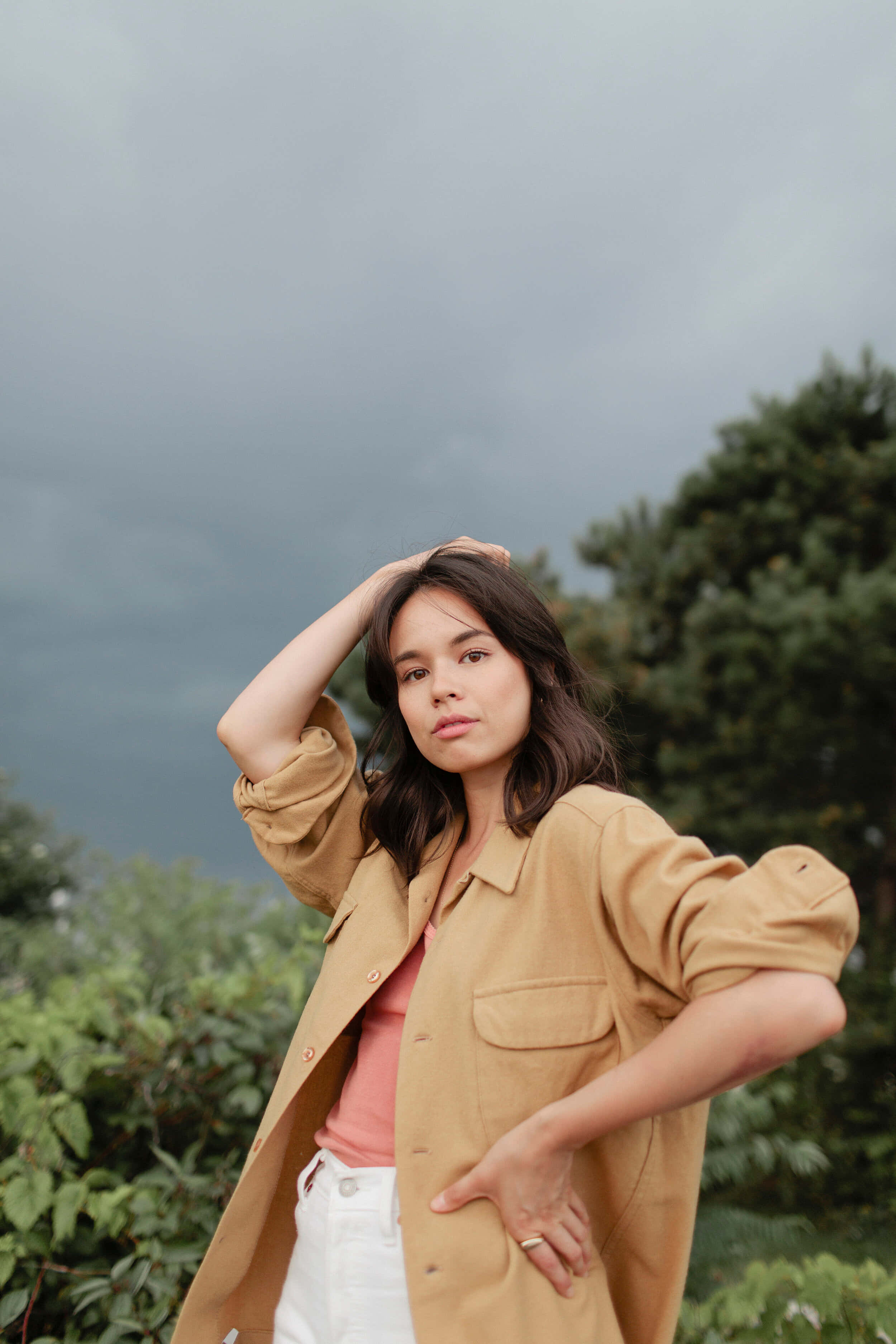 Genevieve Kang, tan jacket, cloudy sky, 2K Phone Wallpaper