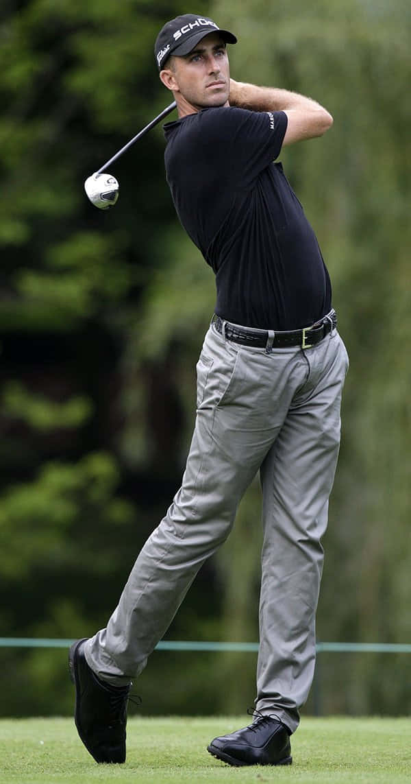 Geoff Ogilvy, post swing stance, black shirt, SD Phone Wallpaper